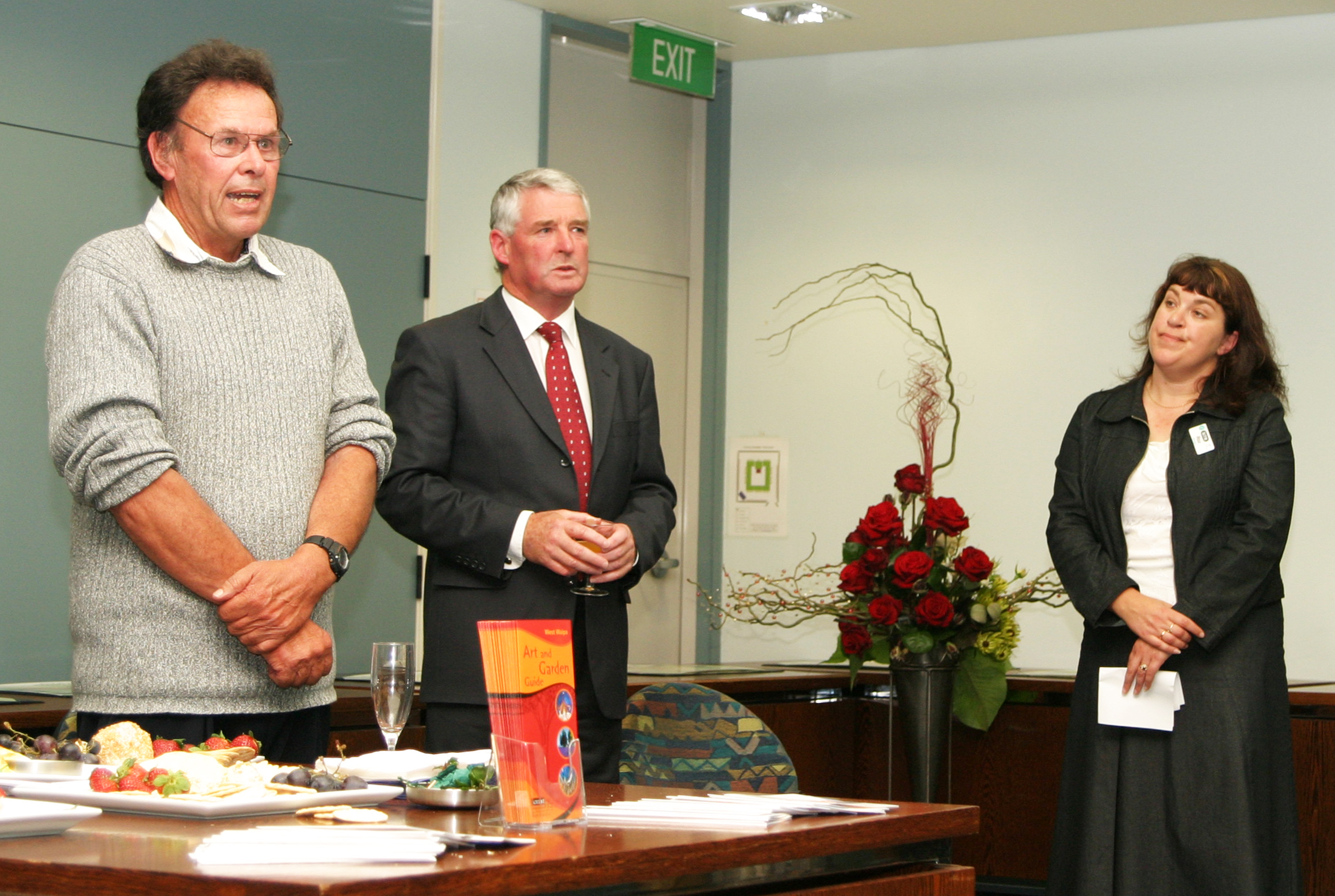 Scream Rosetown Festival 2006 co-organiser Roz Liddell (right) at the opening event, an exhibition of photographs by the late Phil Brown (left), with then Waipā District Mayor Alan Livingston. Photo / Dean Taylor