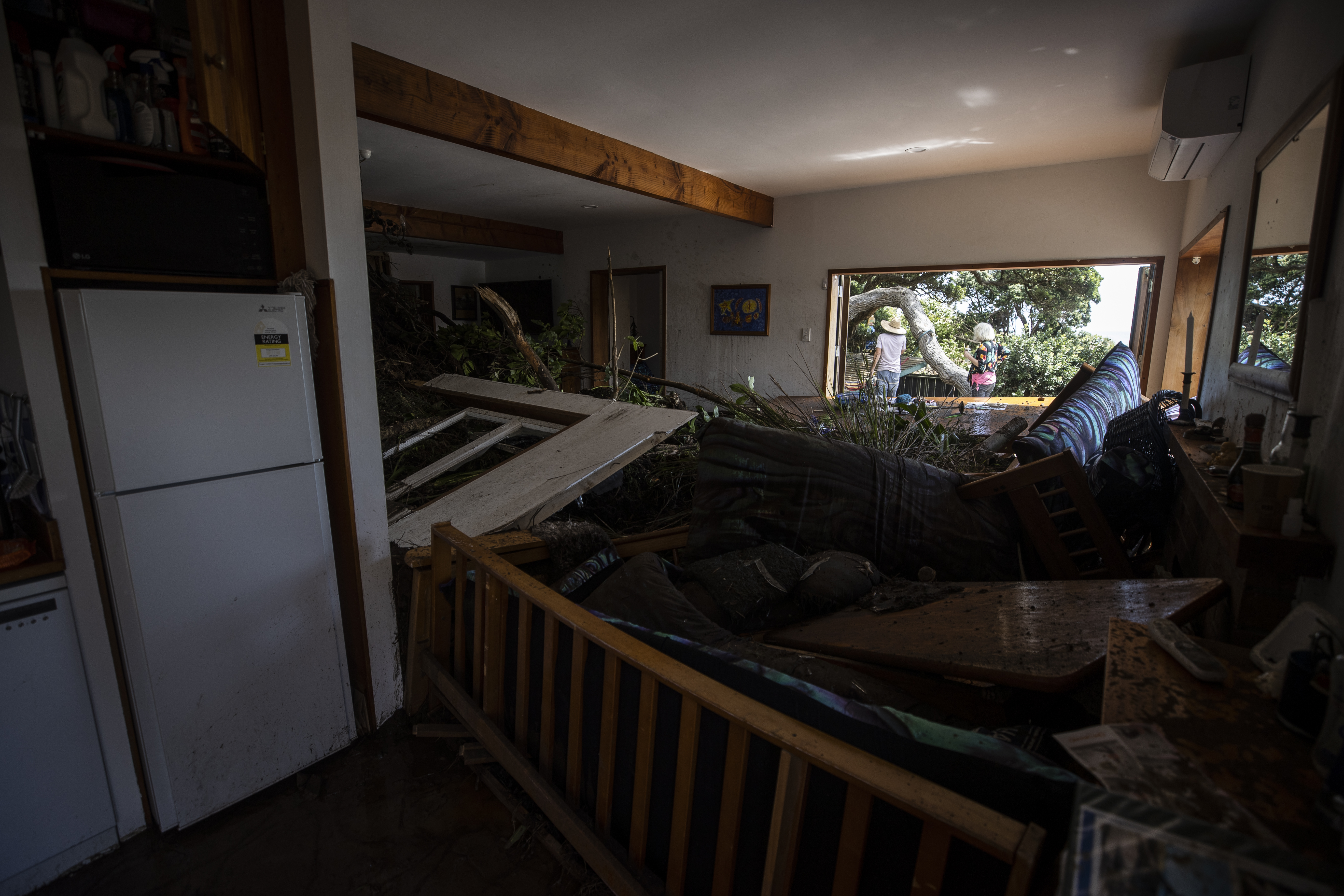 Vicki Pomeroy's Piha house was inundated by a slip during Cyclone Gabrielle. Photo / George Heard