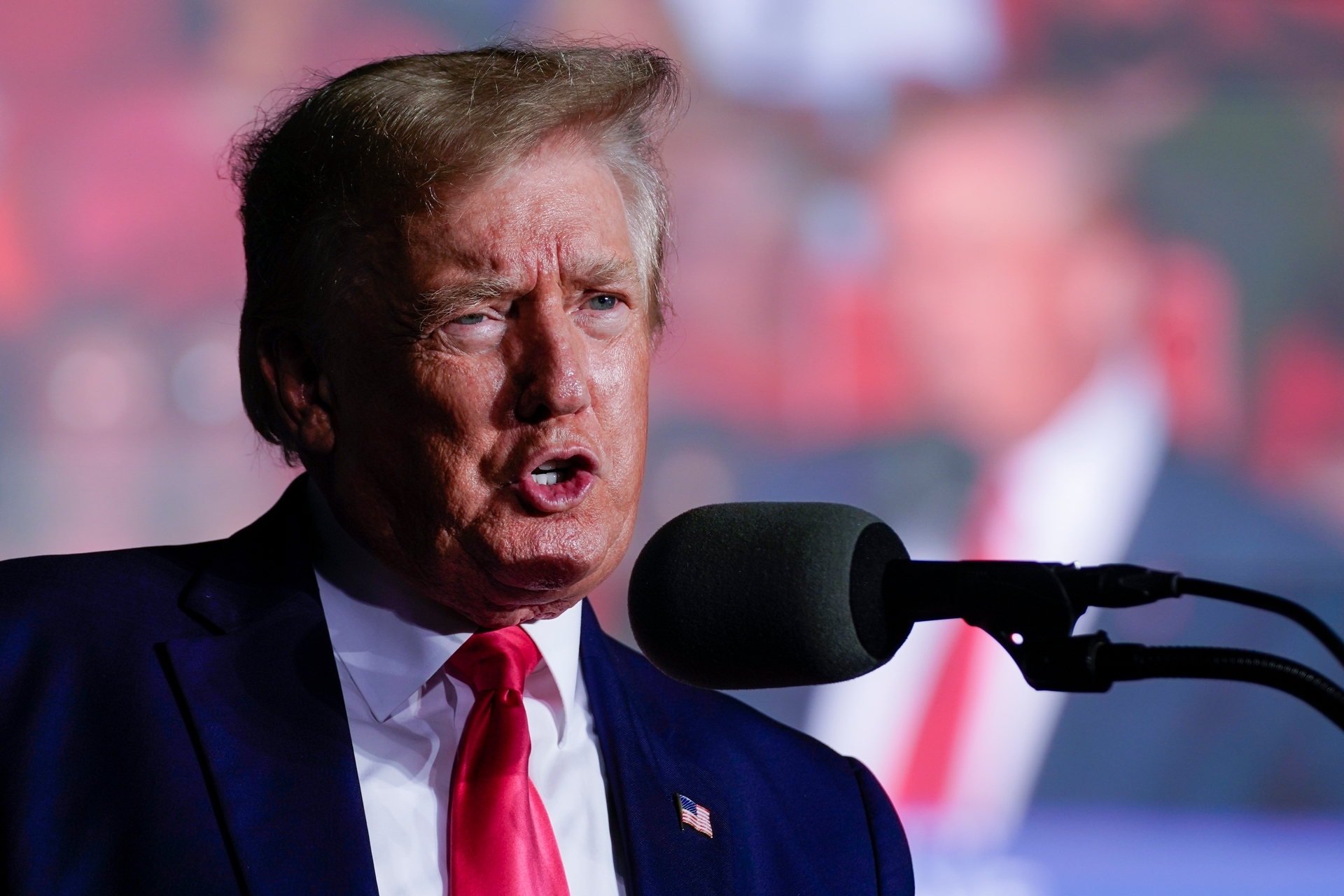 Former US President Donald Trump speaks at a rally. Photo / AP