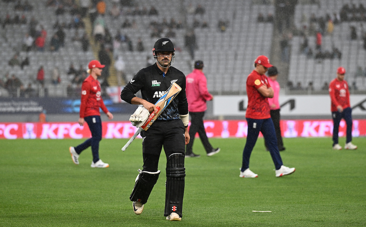 Tim Robinson of the Black Caps leaves the field for rain in the third T20 against England. Photo / Photosport