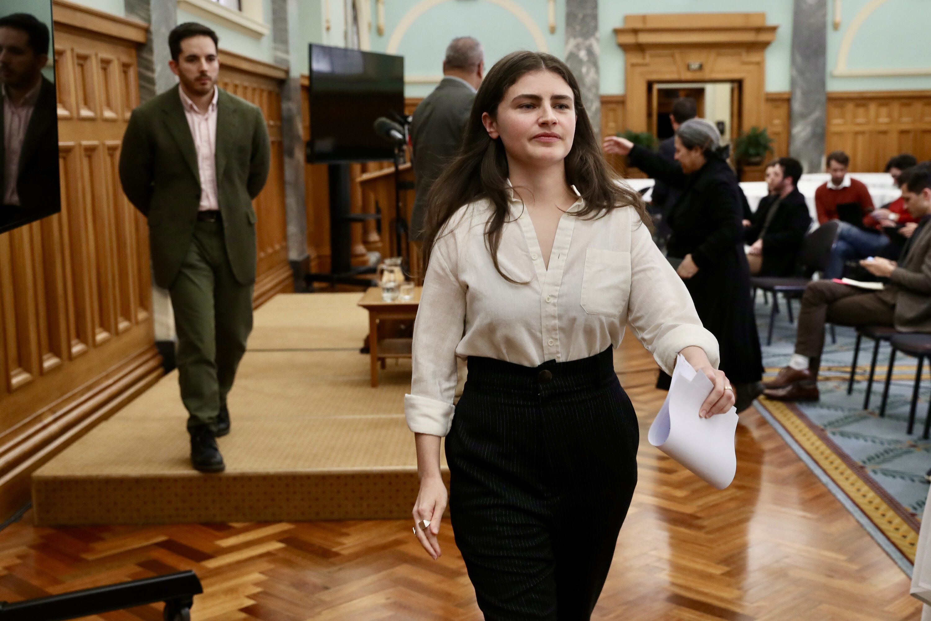 Green co-leader Chloe Swarbrick leaving the conference where she announced Tana had been expelled. Photo / Mark Mitchell 