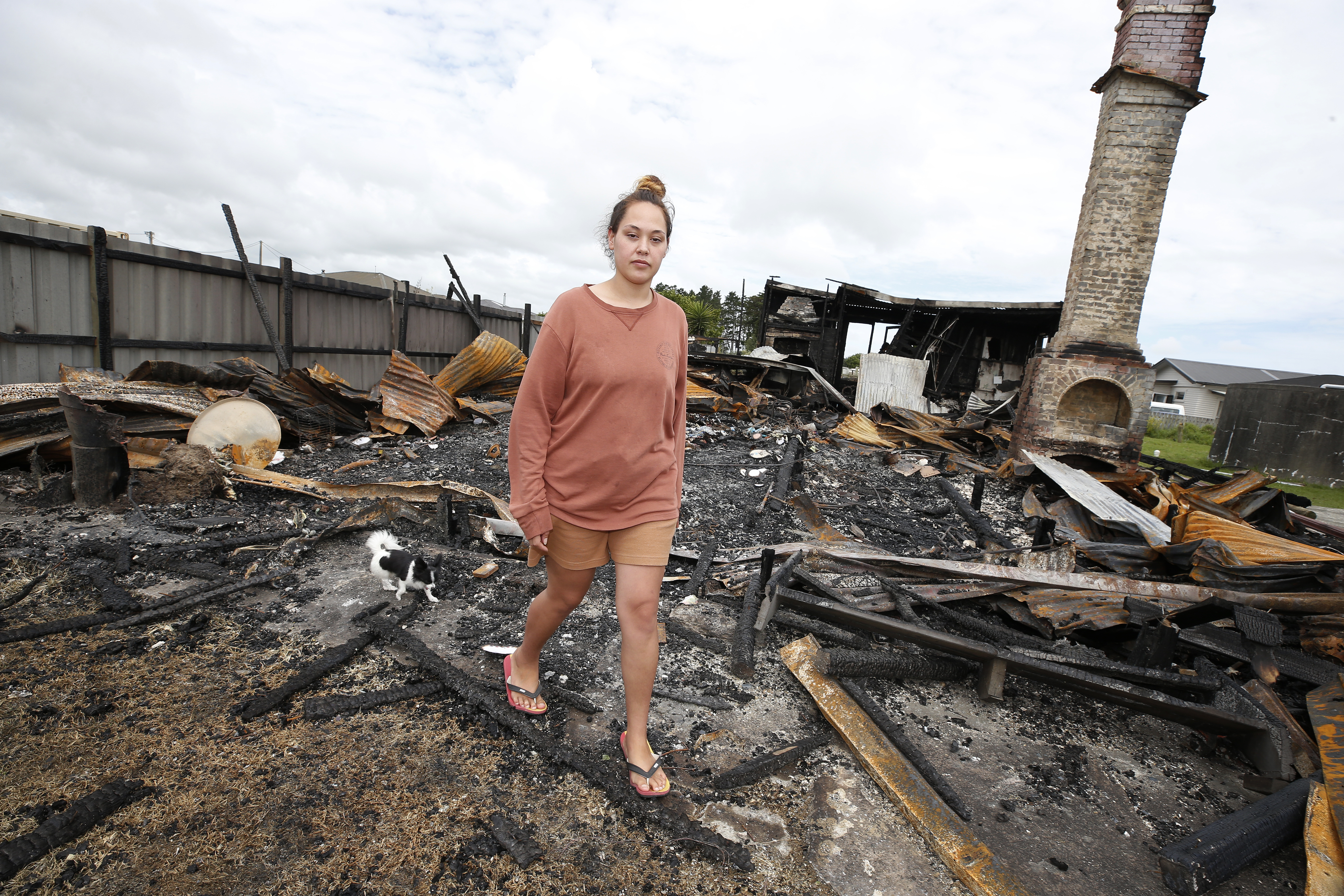 Shakaya Kira and her two babies are without a home, after a winds from Cyclone Gabrielle sparked a fire. Photo / Michael Cunningham
