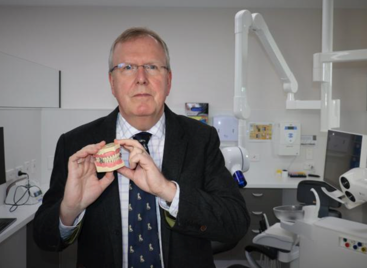 DentalSlim Diet Control: Weight loss device developed in Dunedin locks  mouth almost shut - NZ Herald