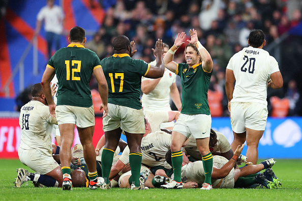 PARIS, FRANCE - OCTOBER 21: Faf de Klerk of South Africa  celebrates after the team is awarded a penalty during the Rugby World Cup France 2023 match between England and South Africa at Stade de France on October 21, 2023 in Paris, France. (Photo by Cameron Spencer/Getty Images)