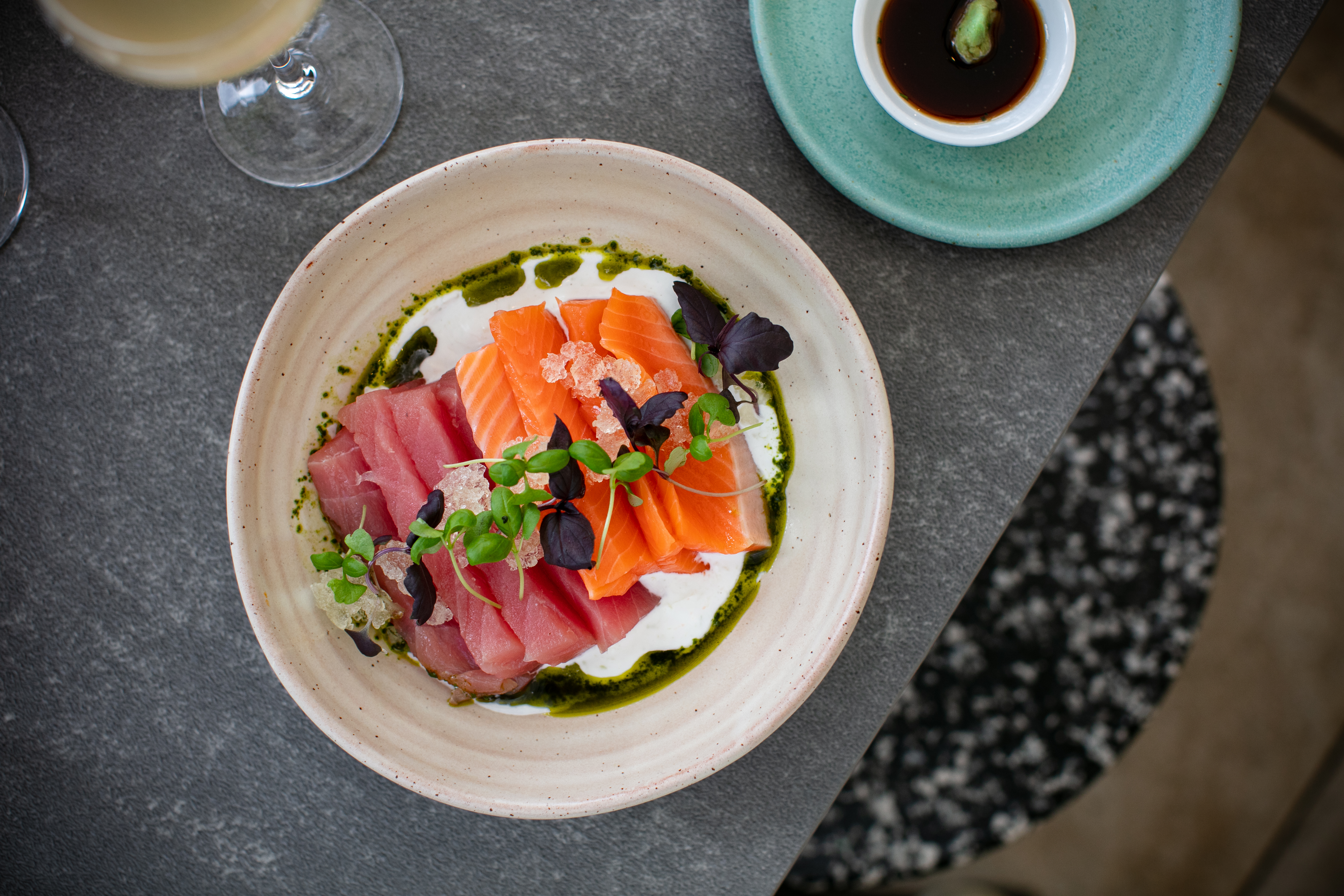 The sashimi selection, with dashi jelly, lime, coconut cream and basil. Photo / Babiche Martens