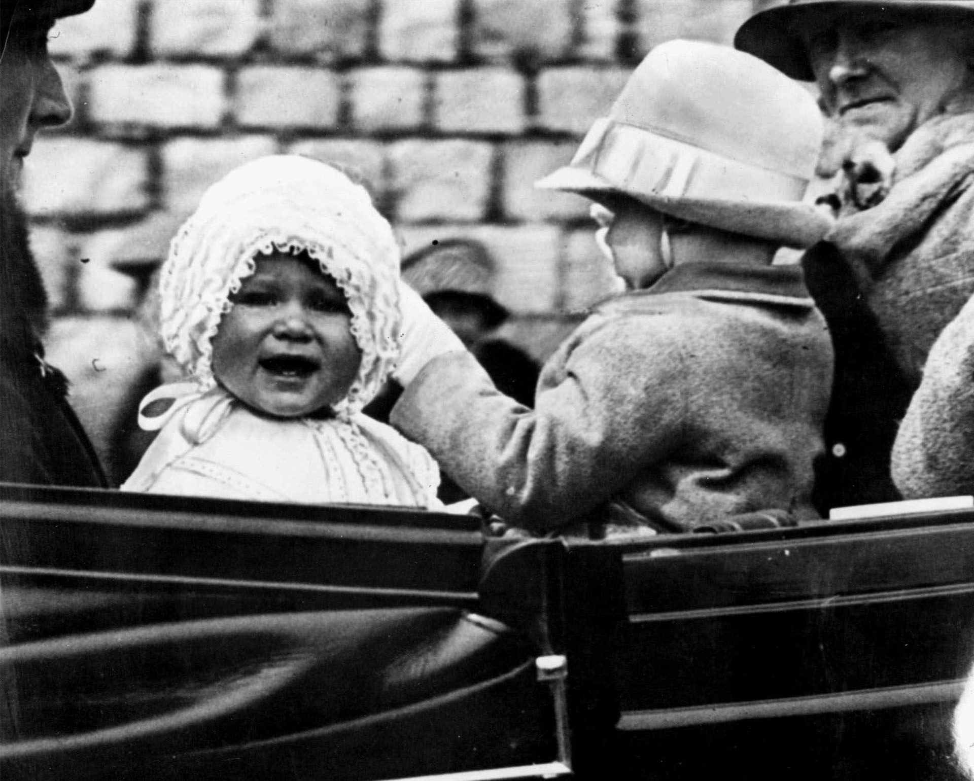 Princess Elizabeth is taken for a ride in the grounds of Windsor Castle in 1927. Photo / AP