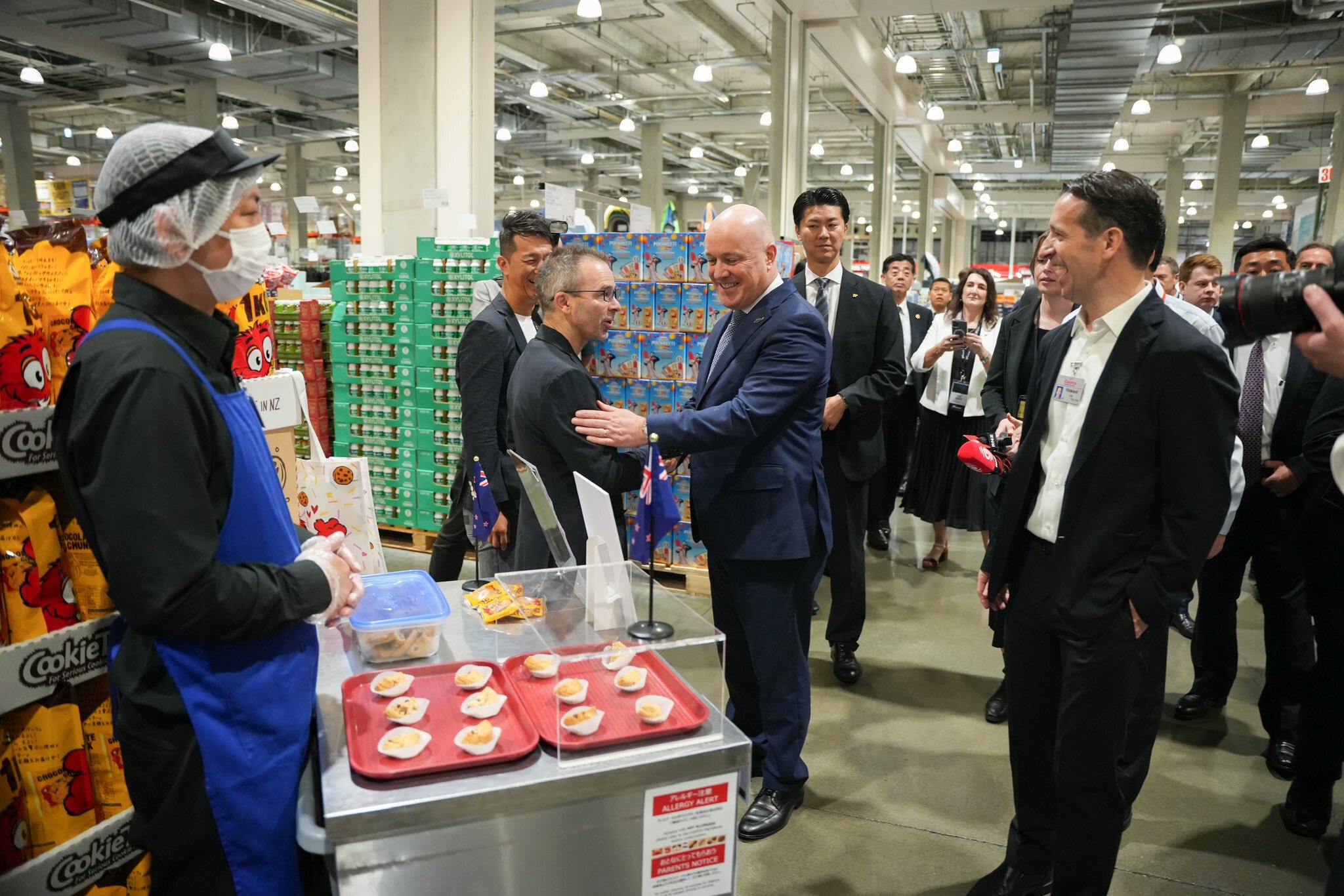 Prime Minister Christopher Luxon meets with Japanese buyers and New Zealand producers at a Costco supermarket in Tokyo.