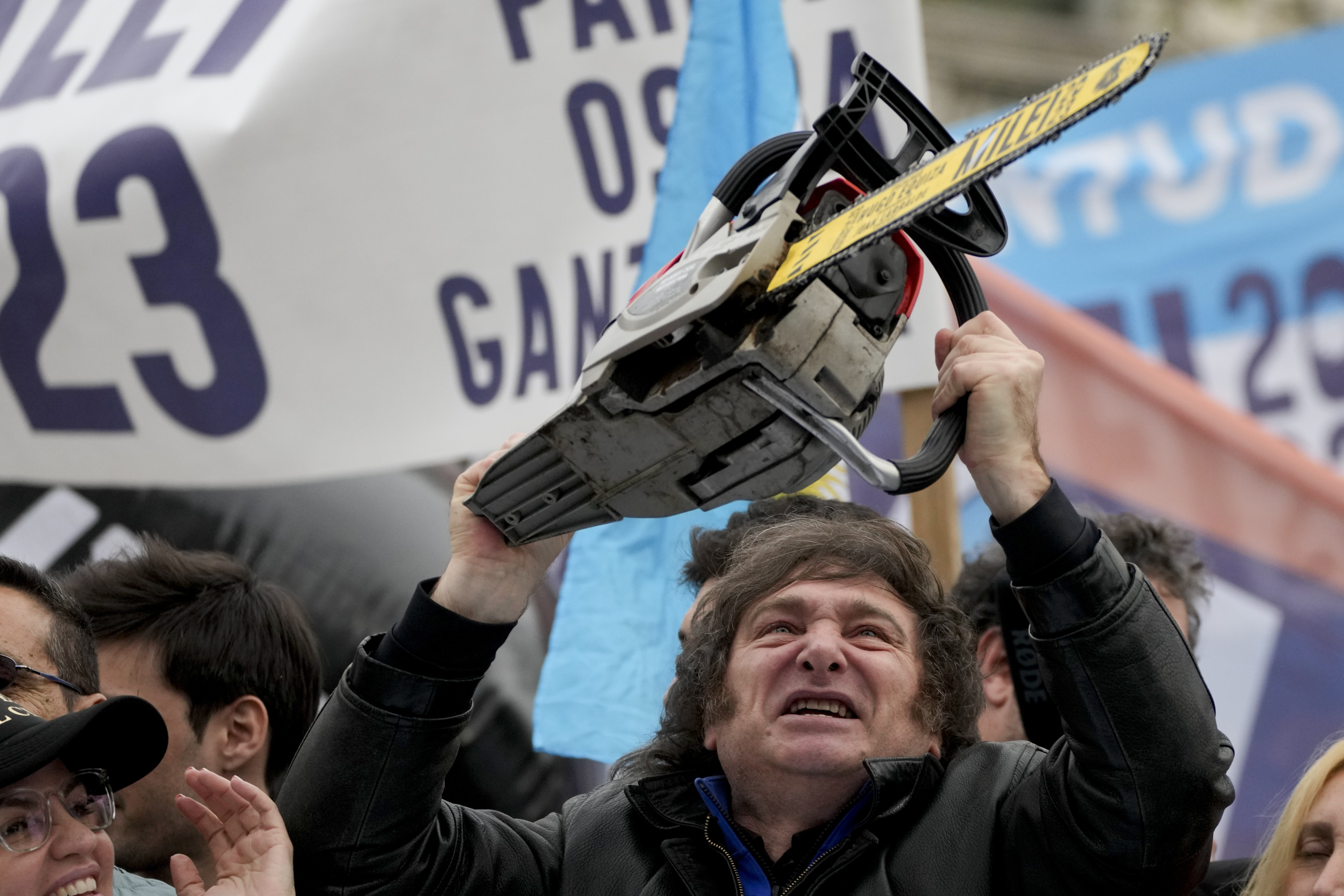 Presidential hopeful of the Liberty Advances coalition, Javier Milei, brandishes a chainsaw during a campaign event in La Plata, Argentina on Tuesday, September 12, 2023. Milei has used the chainsaw throughout his campaign to symbolise how he will slash government spending and waste. The country's general elections are set for October 22. AP Photo / Natacha Pisarenko