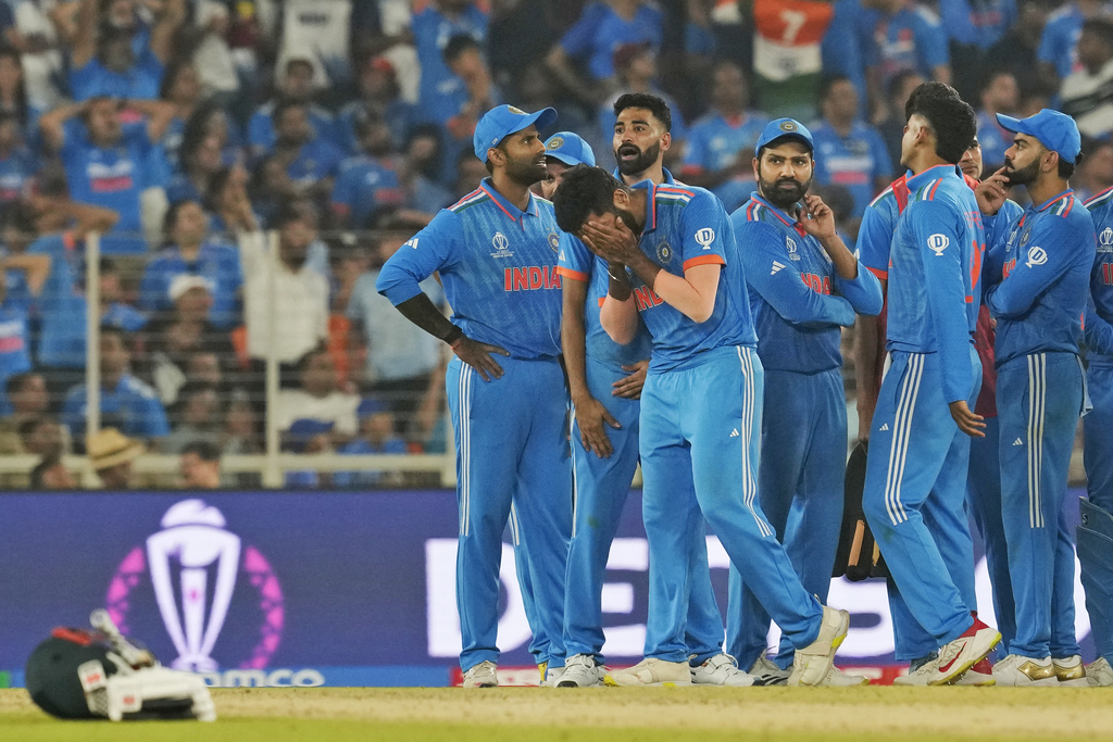India's Jasprit Bumrah, front, holds his head in disappointment after a not-out decision against Australia's Marnus Labuschagne was upheld by the third umpire. Photo / AP