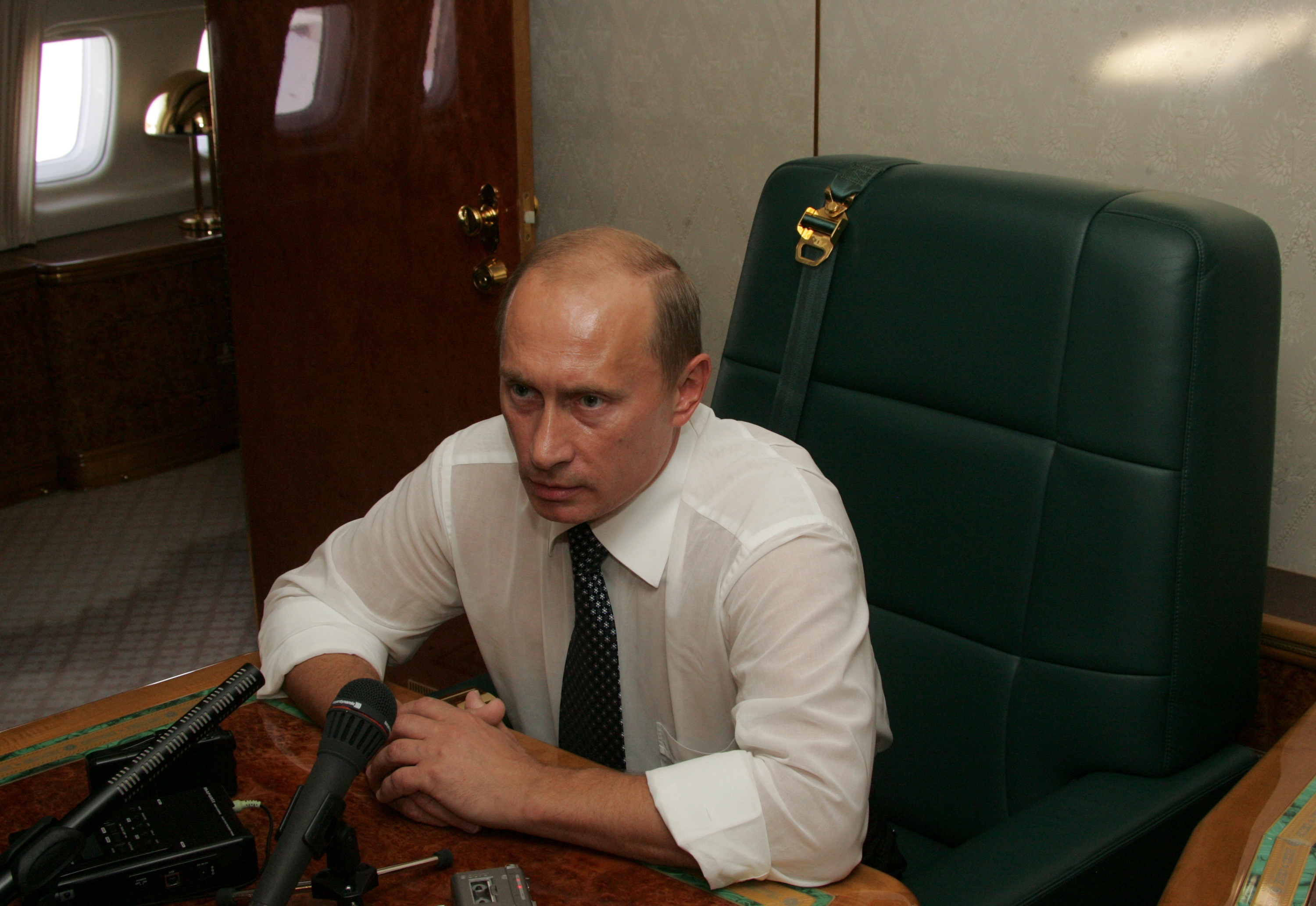 Russian President Vladimir Putin seats inside of his presidental Ilyushin IL-96 plane. Photo / Getty Images