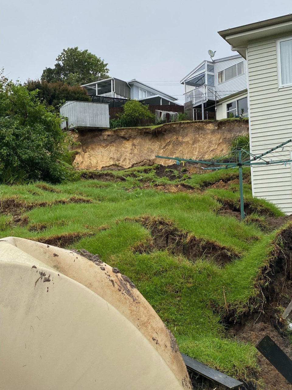 A large slip from a neighbouring house blocked this residient's access. Photo / Catherine Gibson