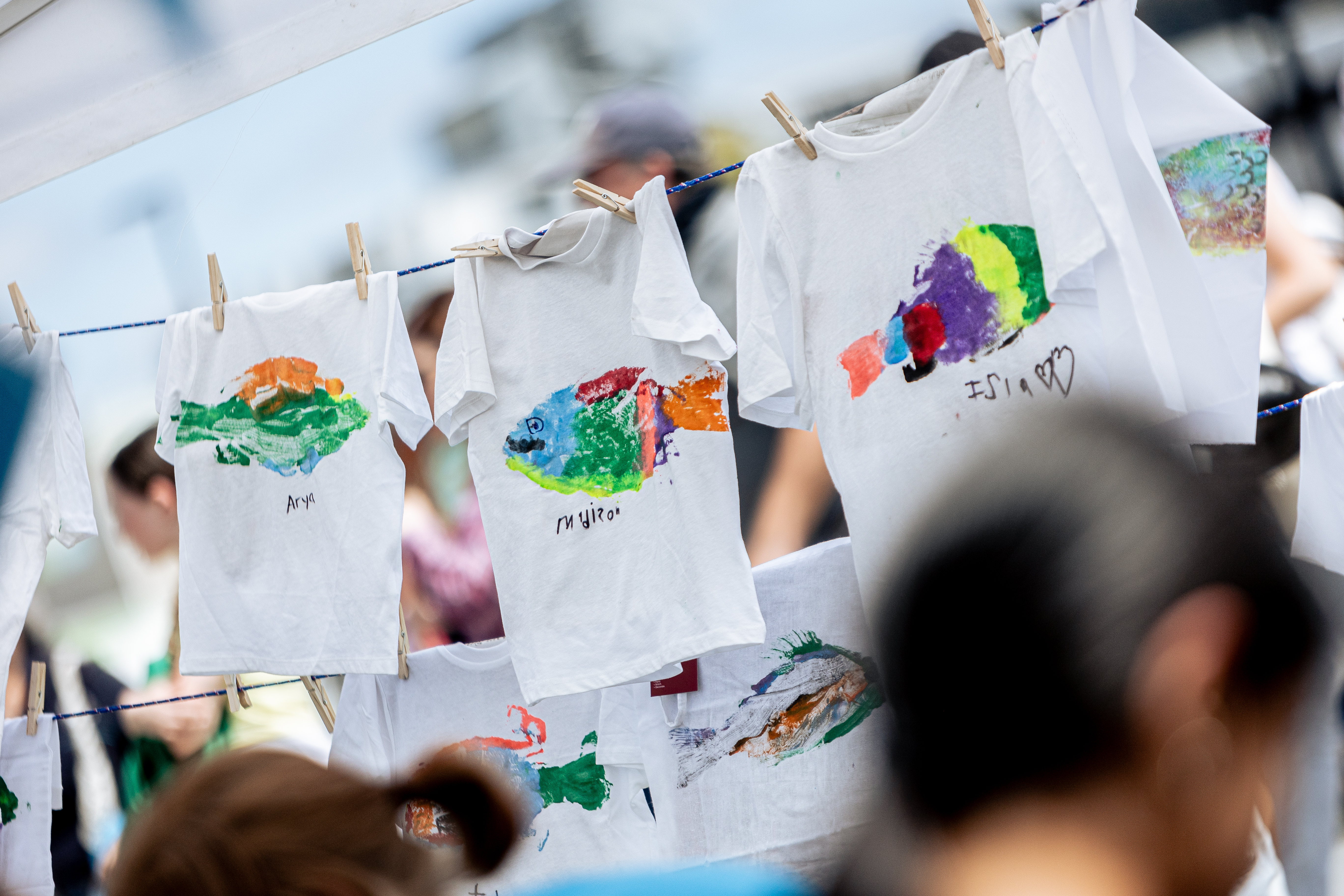More than 500 mainly young people decorated their own T-shirts, bags and pieces of material with fish prints using the ancient Japanese art of gyotaku at a hugely popular festival tent. Photo / Whangārei Maritime Festival