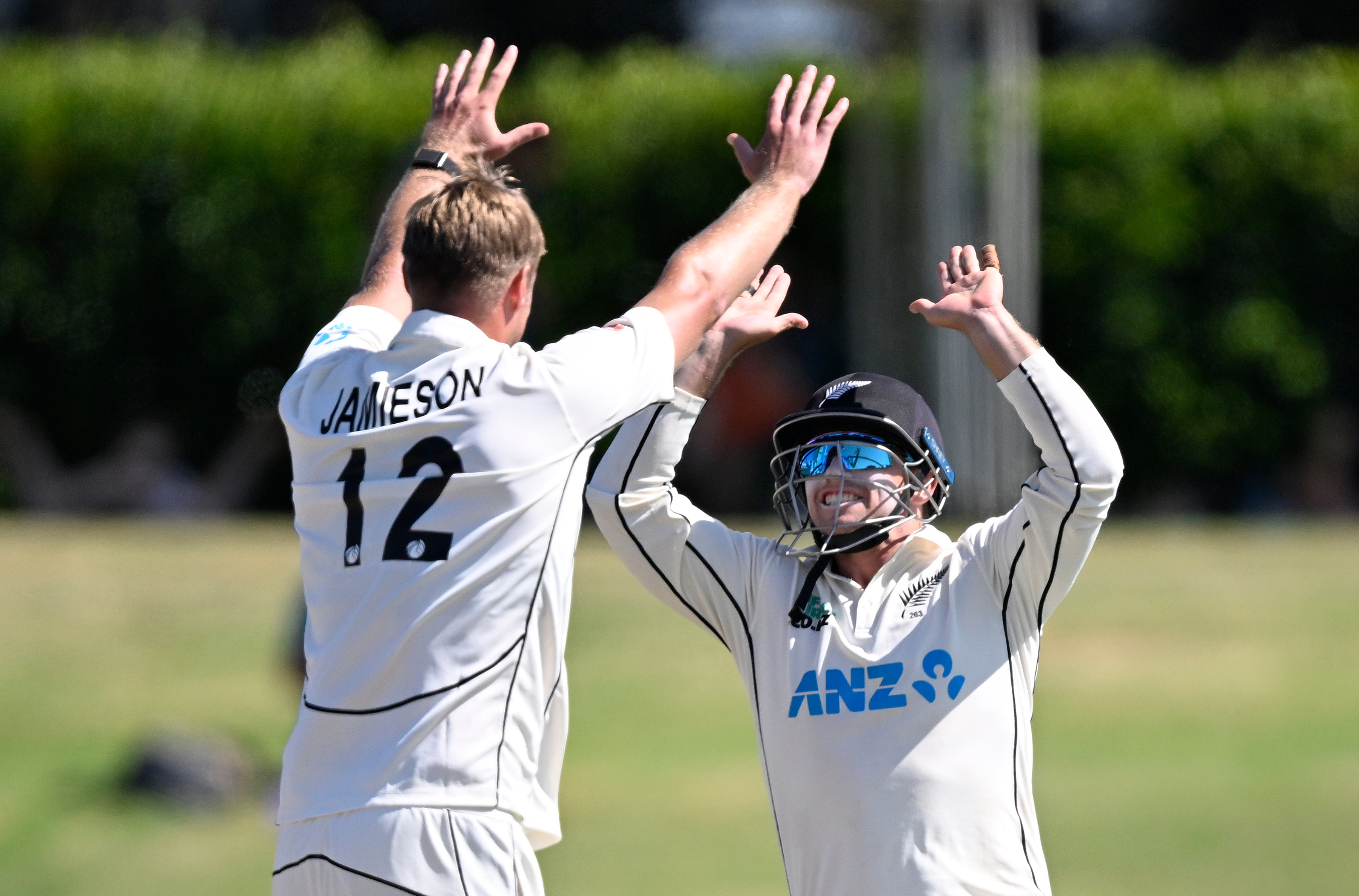 Kyle Jamieson (left) and Tom Latham celebrate the wicket of South Africa's David Bedingham. Photo / Photosport