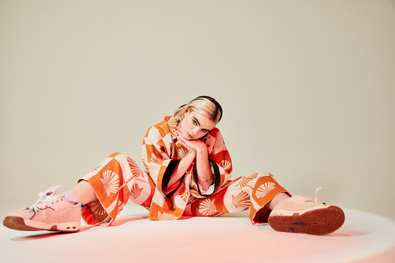 BENEE'S WORLD: Gucci bowling jacket $4300 and trousers $2050. Photo / Frances Carter.