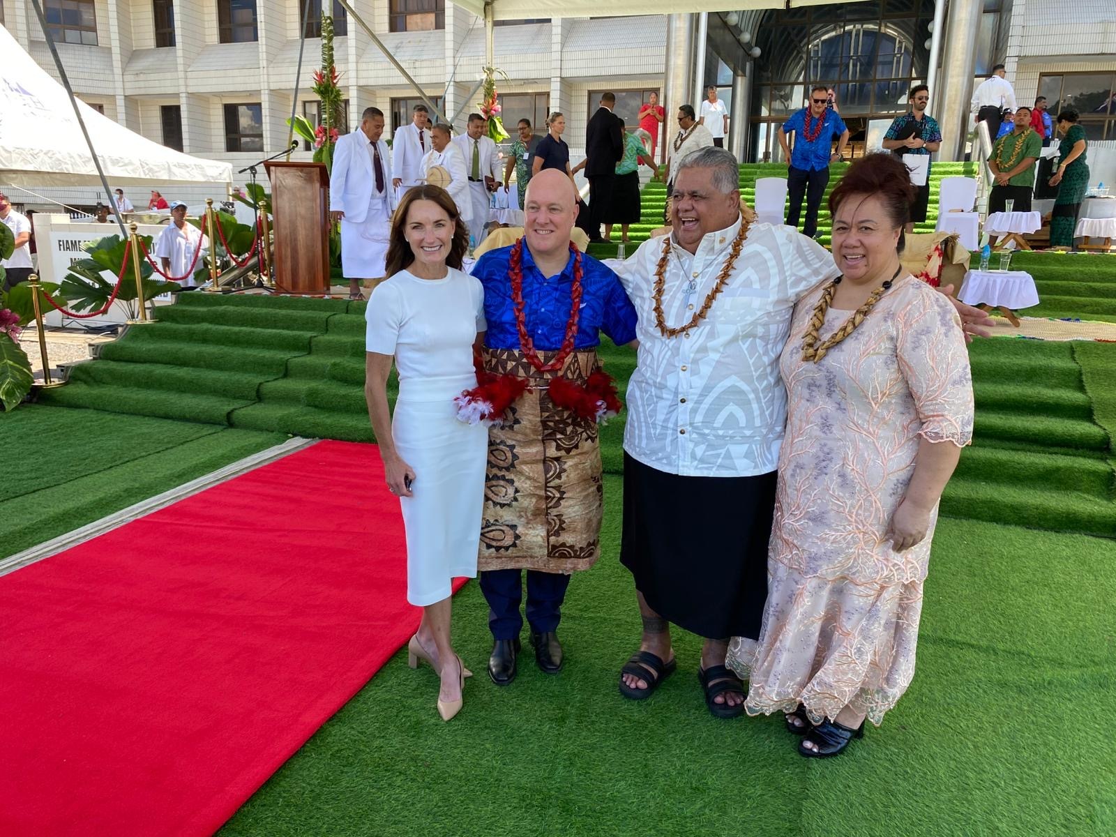 PM Christopher Luxon stands with wife Amanda Luxon (left), Samoa PM La’aulialemalietoa Polataivao Leuatea Fosi Schmidt (centre right) and his wife Tupea Heather Schmidt, during a traditional ava ceremony to formalise the bestowal of Luxon's matai title. Photo / Julia Gabel