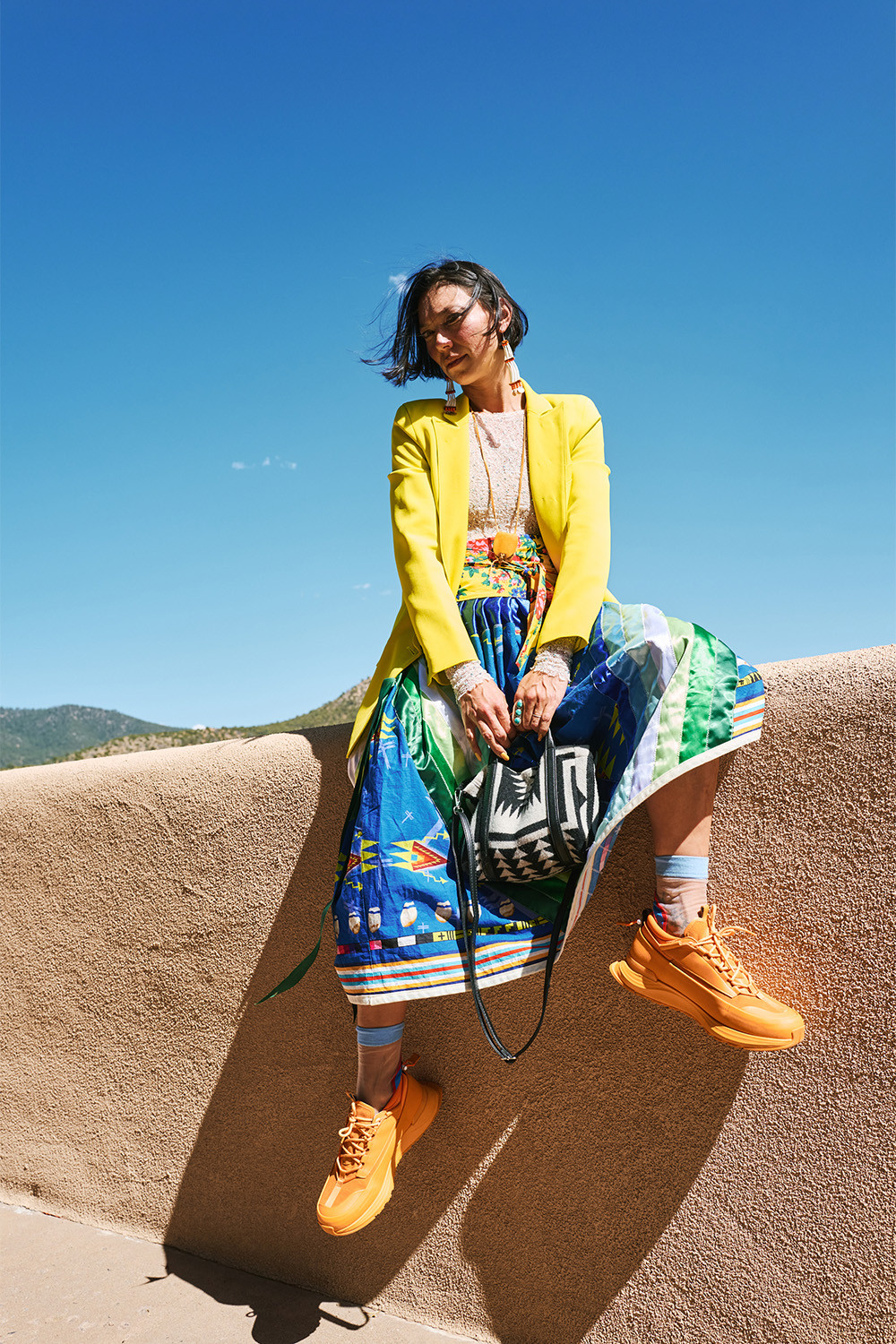Sarain Fox, a Canadian Anishinaabe activist and filmmaker, in a custom ribbon skirt. Photo / Simbarashe Cha for The New York Times