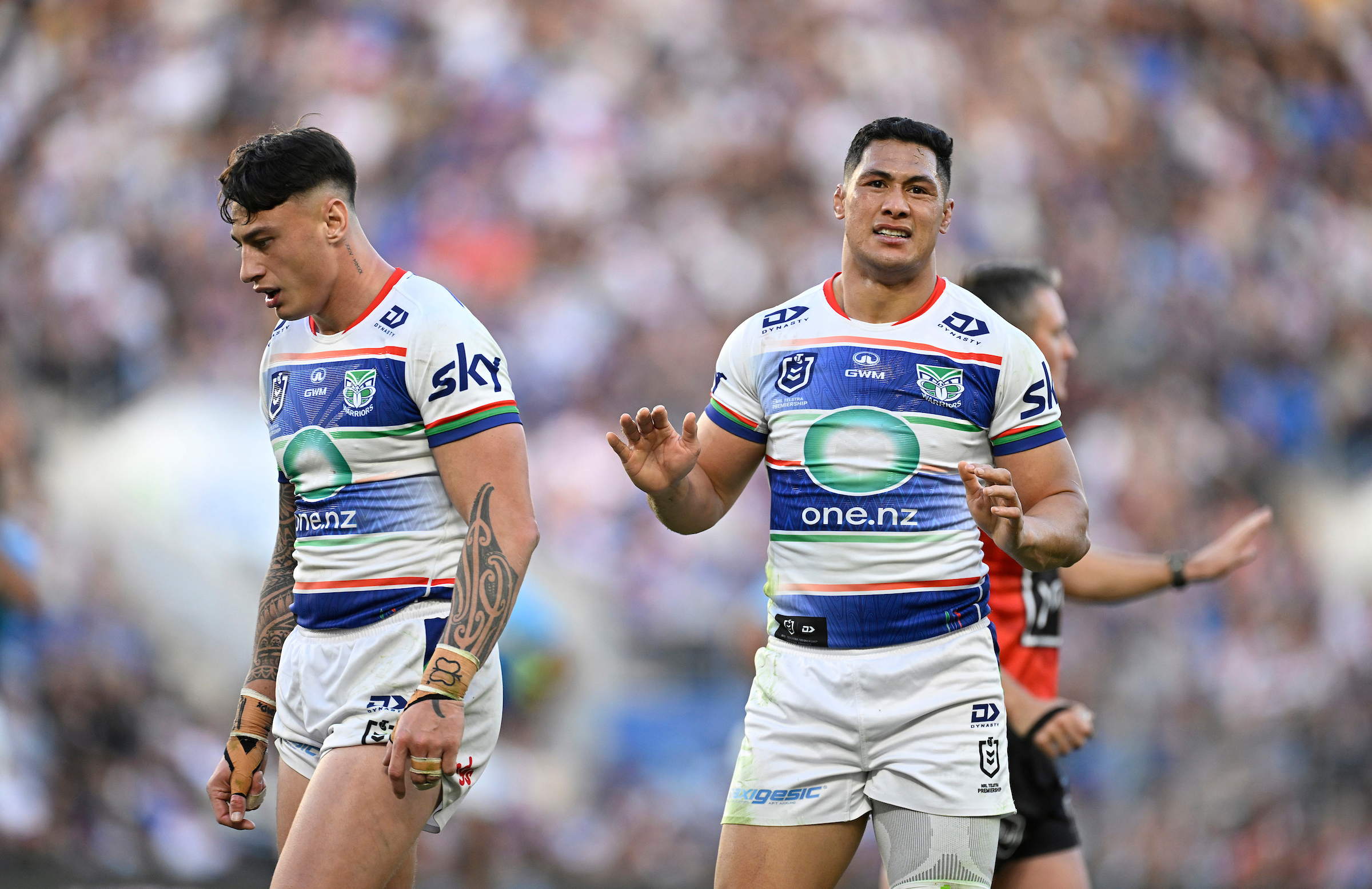 Charnze Nicoll-Klokstad and Roger Tuivasa-Sheck of the Warriors react during the NRL Round 16 match against the Gold Coast Titans.  (AAP Image/Dave Hunt / www.photosport.nz) 