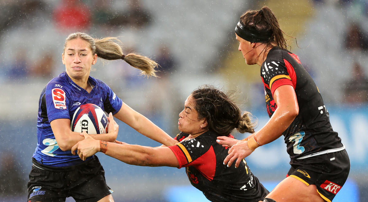 Jaymie Kolose of the Blues takes on the Chiefs Manawa defence in last year's final. Photo / SmartFrame