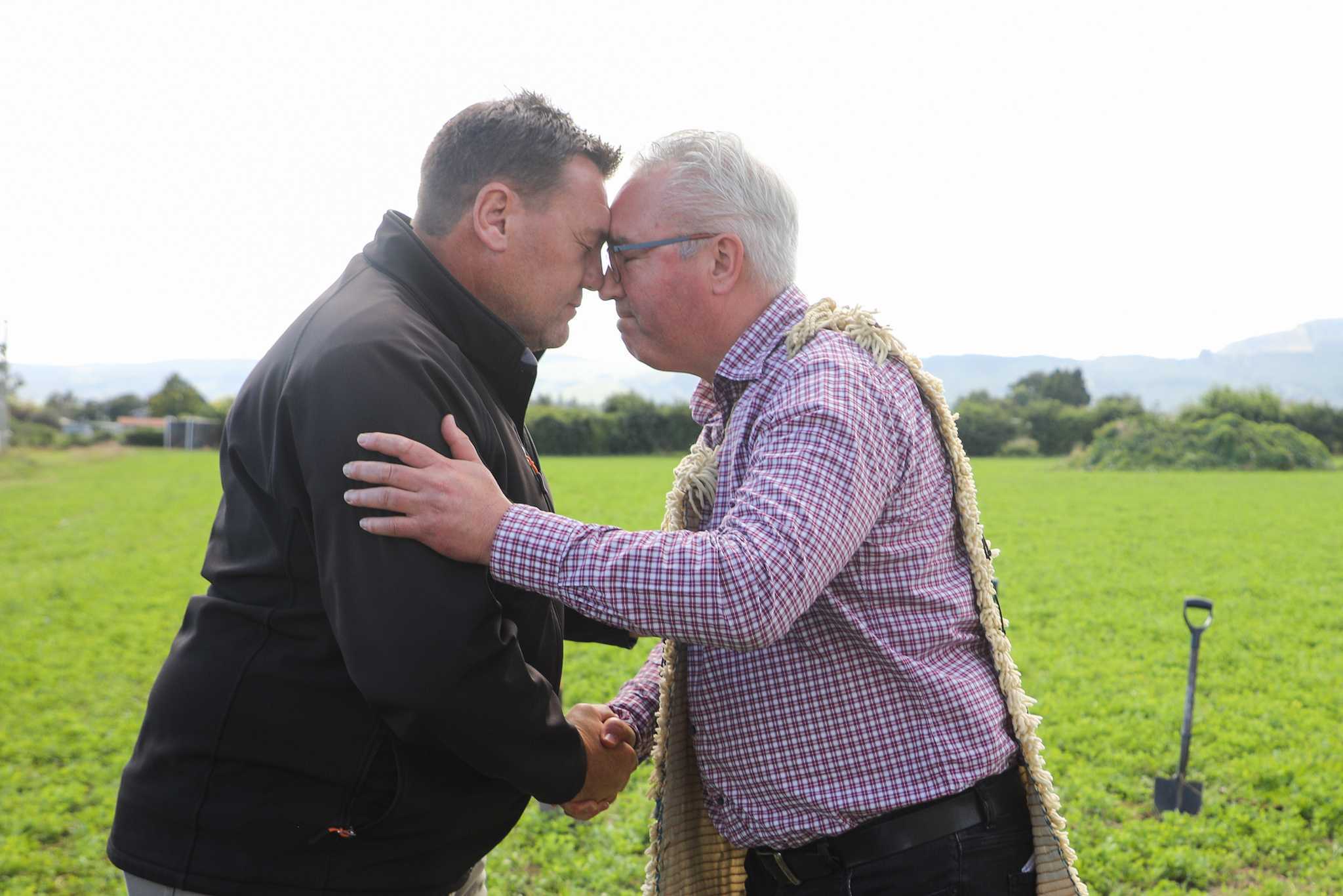 Matco director Matt Paget  (left) and iwi trusts chairman Jason Rogers signed an agreement for earthworks to start on the housing development. Photo / Andrew