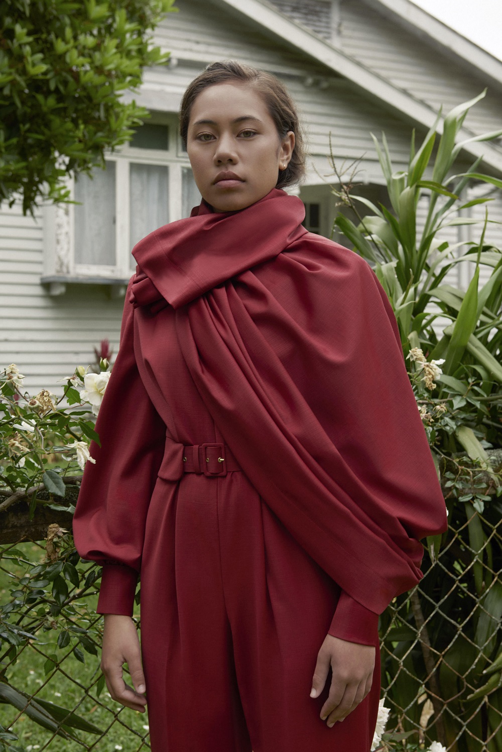 Hope Crockett, 18, from McAuley High School wears a look from the Emilia Wickstead x Woolmark collection. She was part of the winning Samoan group at the 2018 Polyfest, an annual Polynesian dance competition that Emilia Wickstead took part in as a teenager. Photos / Derek Henderson for the May 2019 edition of British Vogue. Hair and makeup / Virginia Carde