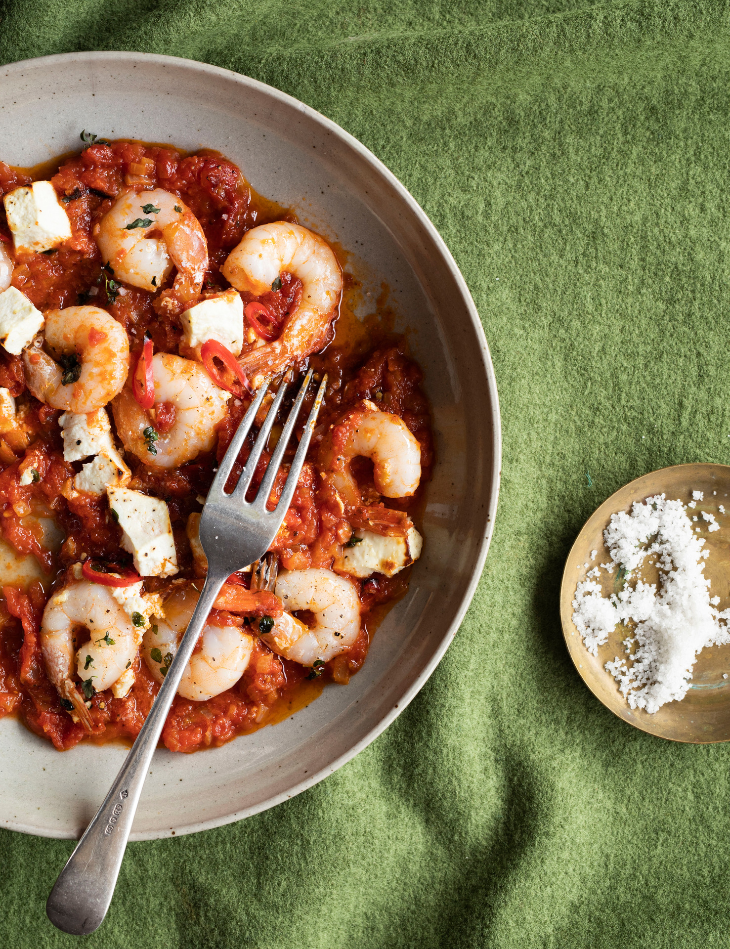 Tomato, thyme and feta prawns. Photo / Bite.co.nz