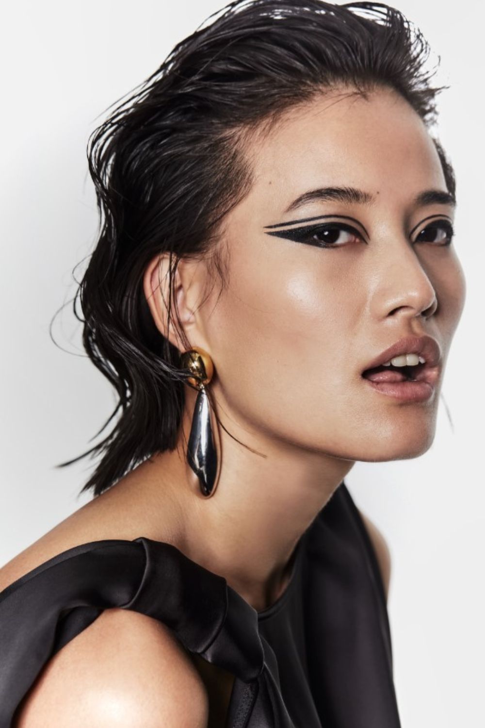 Lin wears Harris Tapper dress and Jasmin Sparrow earrings. Photo / Carolyn Haslett