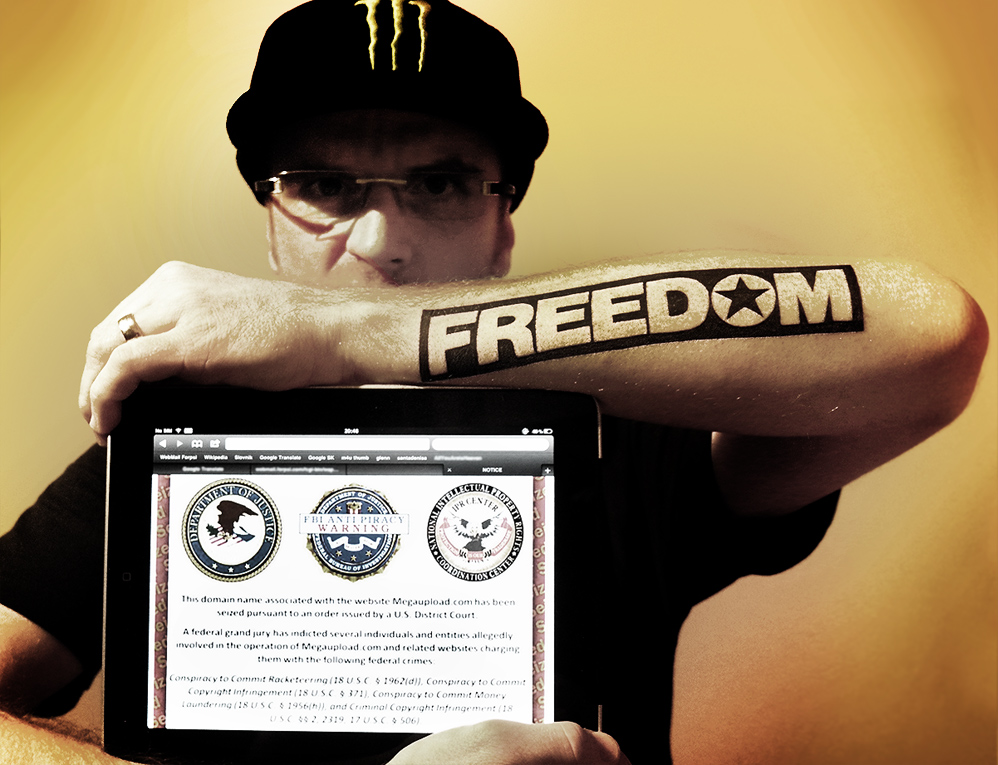 Julius Bencko, posing with a fullscreen image of the Megaupload takedown notice, is now in Czech police custody. Photo / Supplied