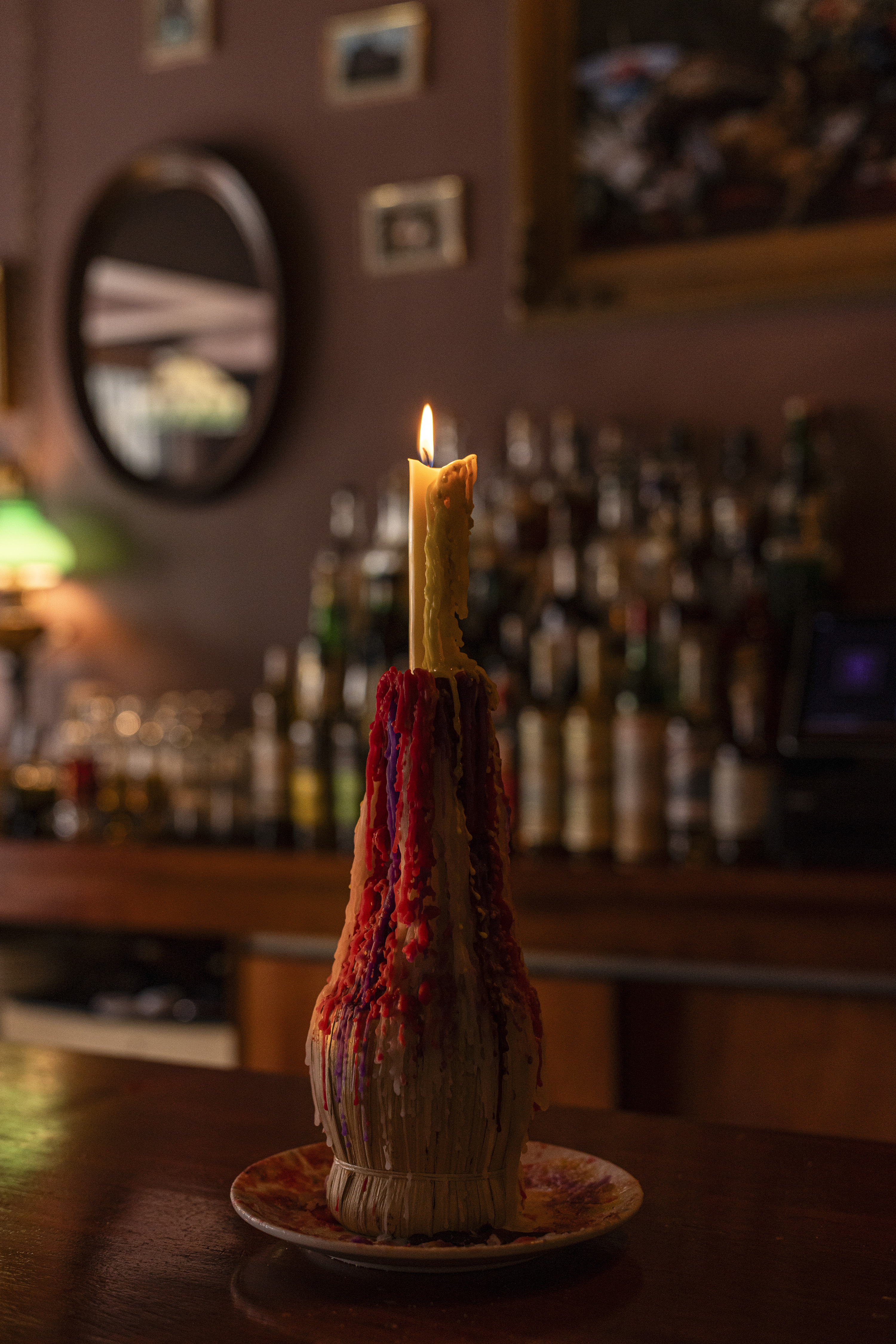 At the Chicago restaurant Void, taper candles in Chianti bottles mimic the ambience of old-school red sauce joints. Photo / Lucy Hewett, The New York Times
