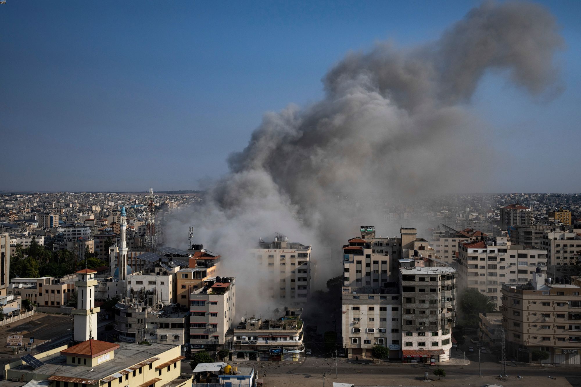 Smoke rises following an Israeli airstrike, in Gaza City. The militant Hamas rulers of the Gaza Strip carried out an unprecedented, multi-front attack on Israel at daybreak on Saturday, firing thousands of rockets as dozens of Hamas fighters infiltrated the heavily fortified border in several locations, killing hundreds and taking captives. Photo / AP
