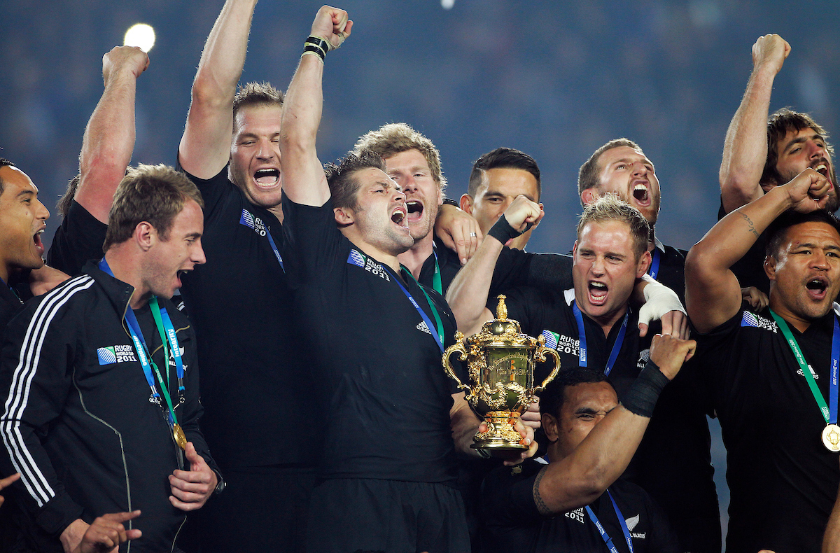 Richie McCaw and the All Blacks celebrate with the Webb Ellis Cup. Photo / Photosport