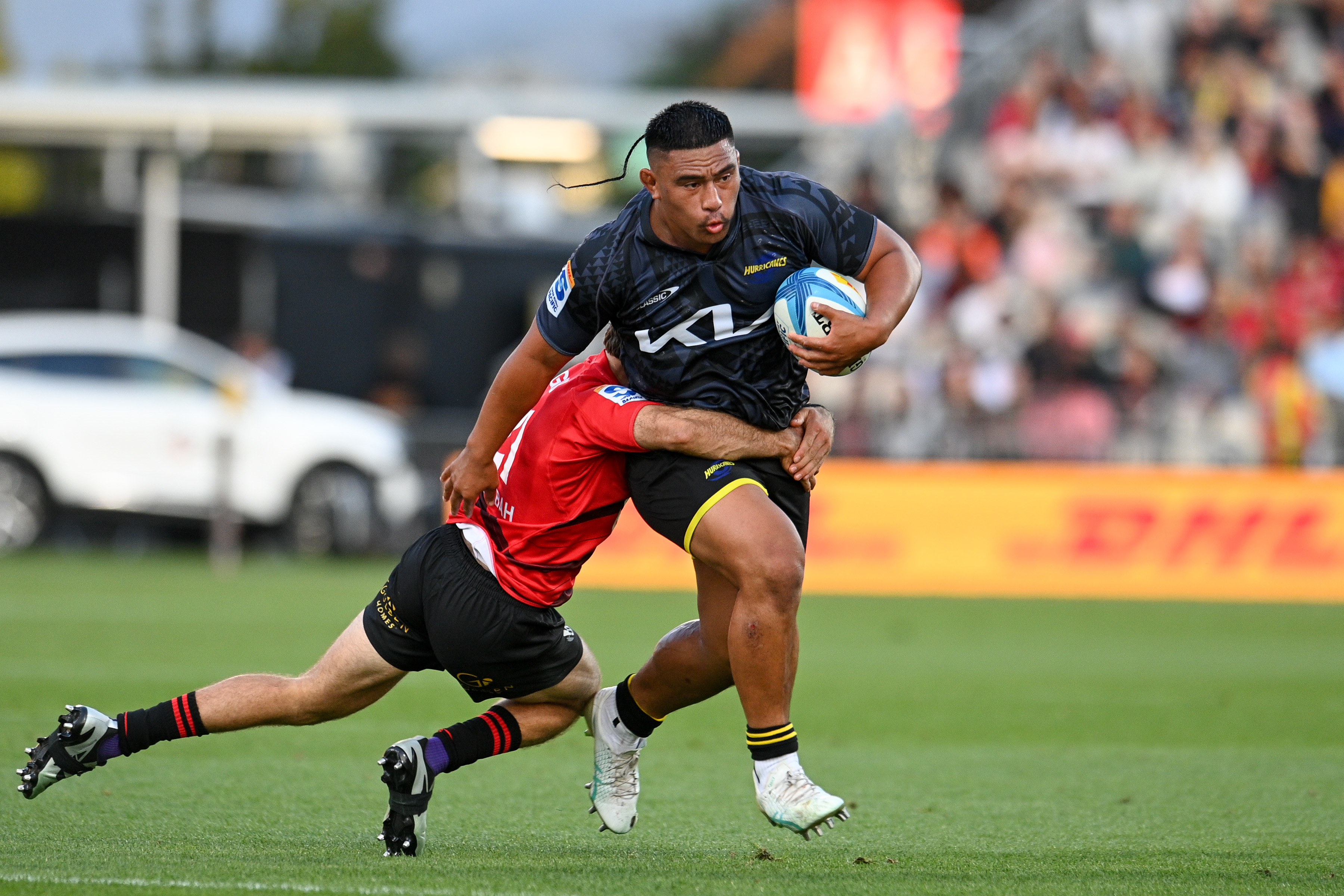 Xavier Numia takes a carry during the Hurricanes' round-one loss to the Crusaders. Photo / Photosport