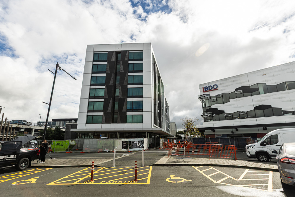 Quest Highbrook (left) and BDO's building at Highbrook provide shelter for expansion of the Highbrook Crossing (centre). Photo / Jason Dorday