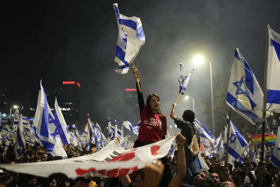 Israelis opposed to Prime Minister Benjamin Netanyahu's judicial overhaul plan block a highway during a protest. Photo / AP