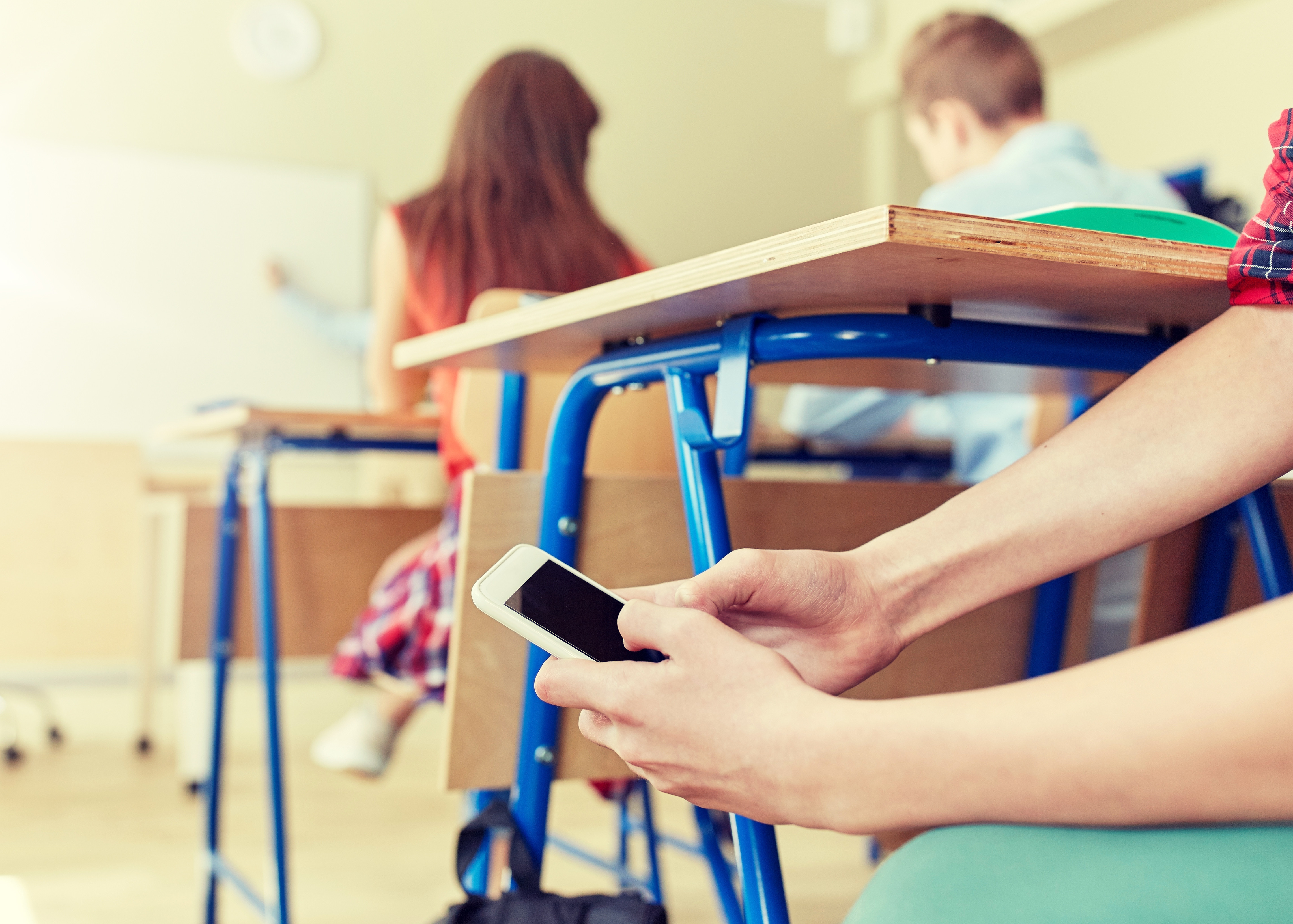 Smartphone bans may also help protect youth against cyberbullying that can happen during class hours. Photo / 123rf