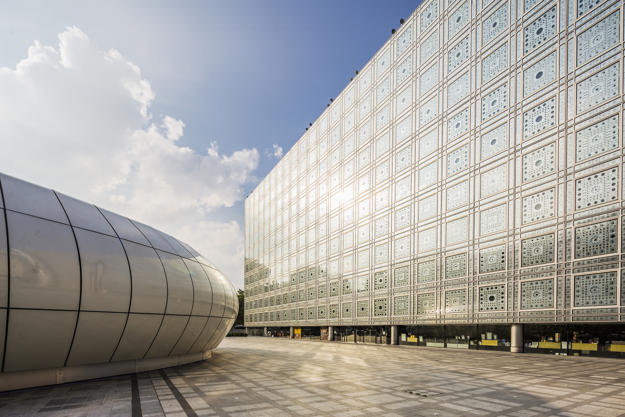 The windows of Paris' Institut du Monde Arabe, right, open and close automatically to regulate the building's indoor temperature and protect the collections inside. Photo / Getty Images