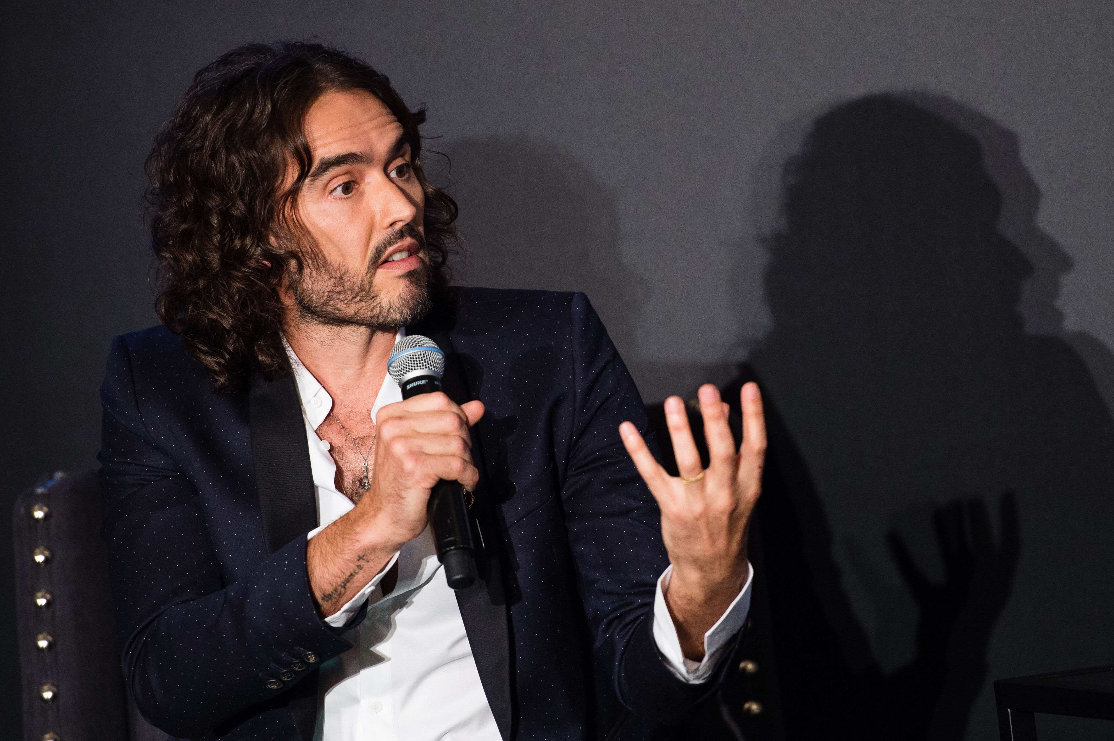 Russell Brand's tour has been postponed. Photo / Getty Images
