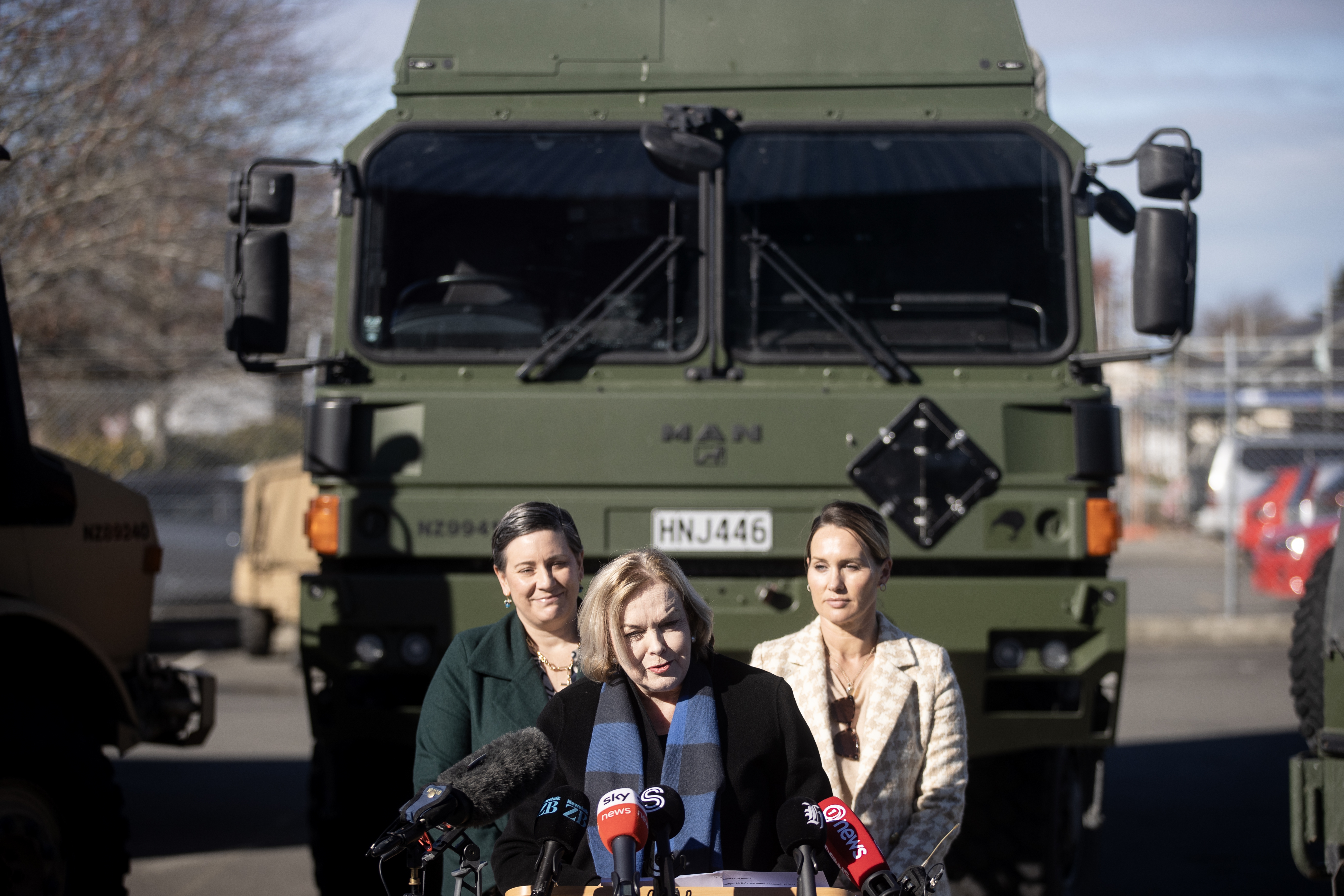 Defence Minister Judith Collins, with National Party minister Nicola Grigg (right) and MP Vanessa Weenink at Burnham Military Camp in Christchurch for the pre-Budget announcement on NZDF pay and projects. Photo / George Heard