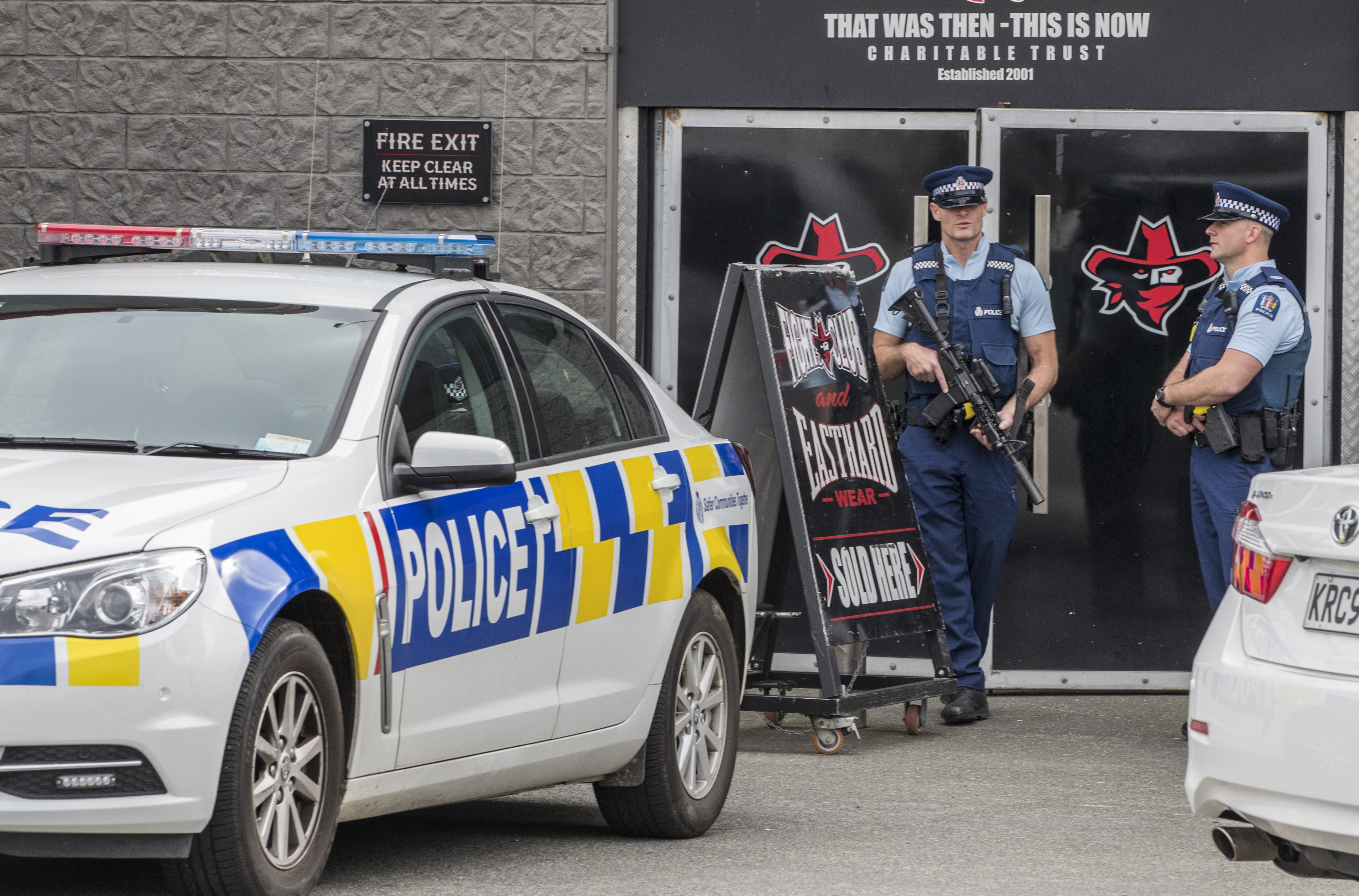 Armed police officers stand guard as they raid the Head Hunters Motorcycle Club clubrooms in Marua Rd, Ellerslie in 2017. Photo / NZ Herald