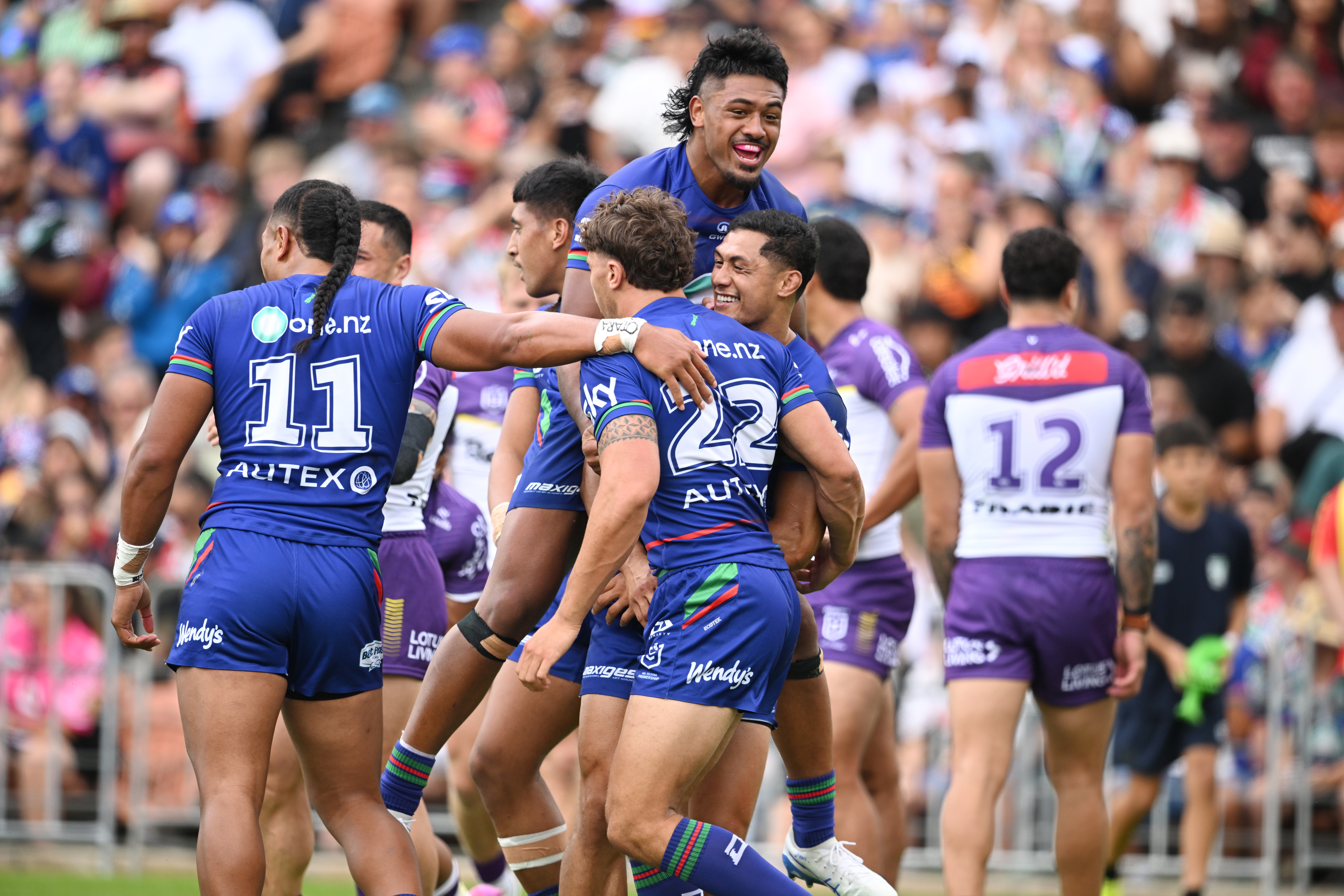 The Warriors celebrate a try for Chanel Harris-Tavita. Photo / Photosport