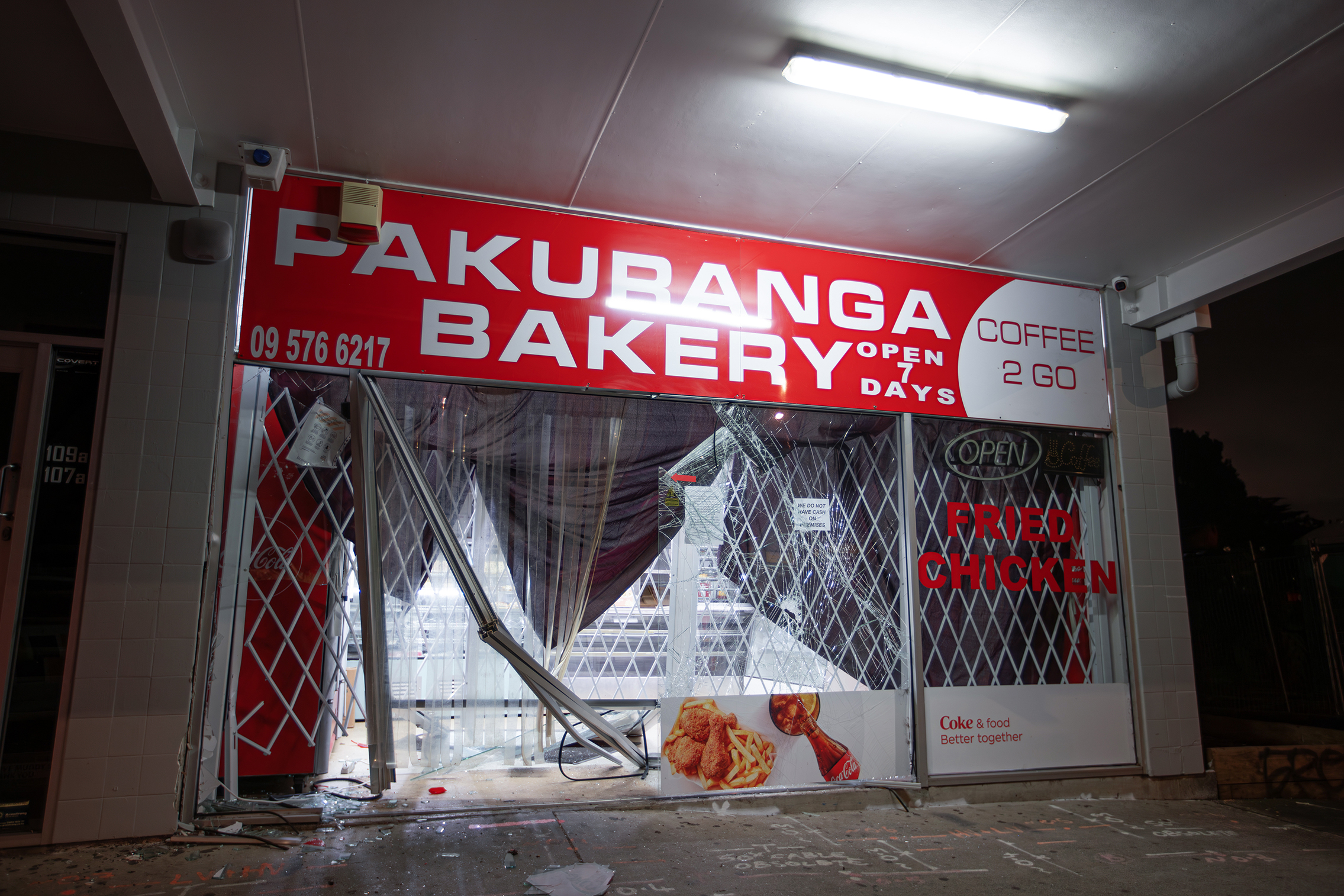 Pakuranga Bakery after the four youths backed a car into the store front late last night. Photo / Hayden Woodward