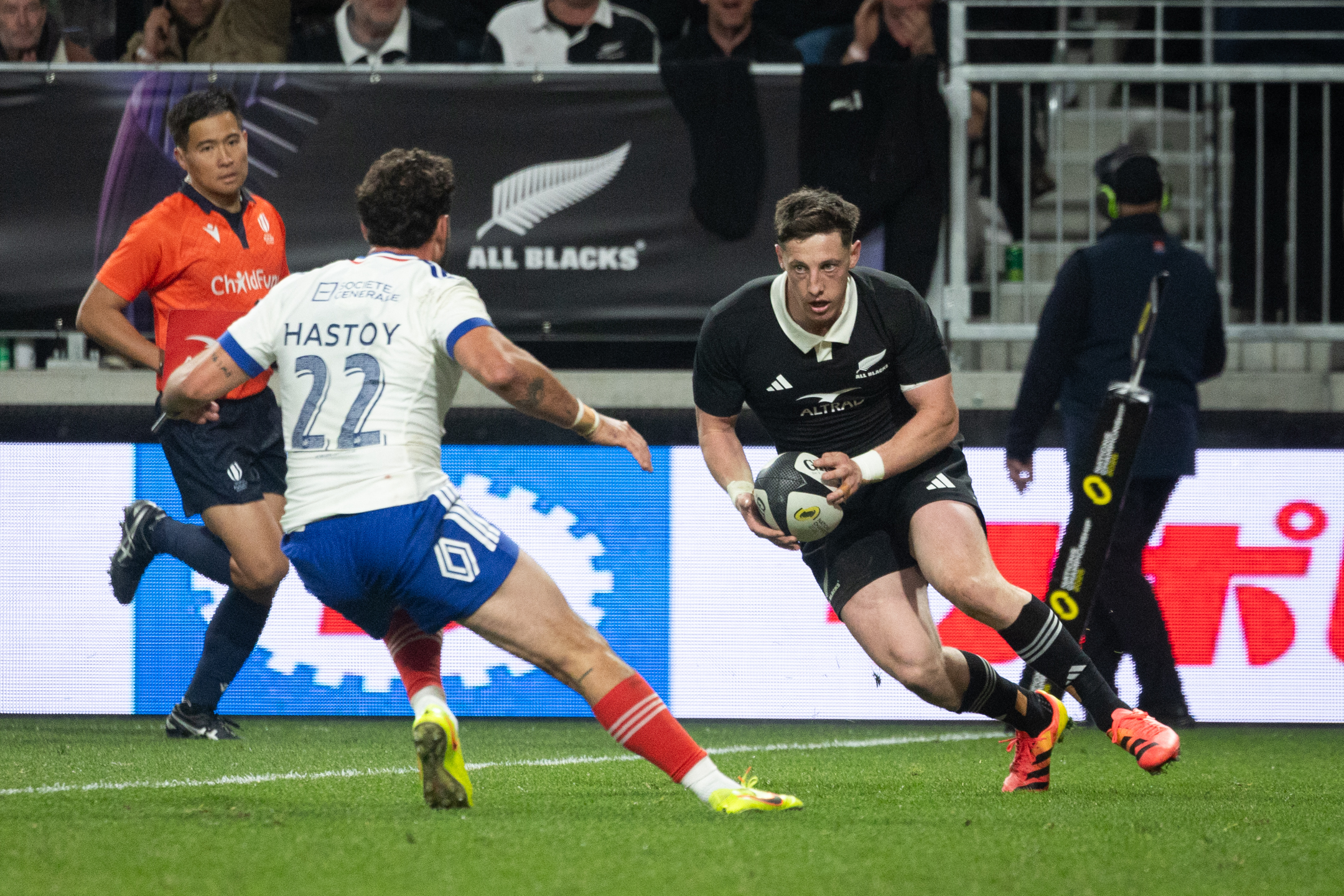 Cam Roigard runs in for his second try against France, in Christchurch. Photo / Anna Heath