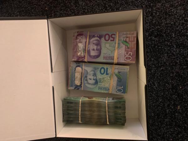 Tauranga police found $40,000 in the home of a Mongol. Photo / Supplied