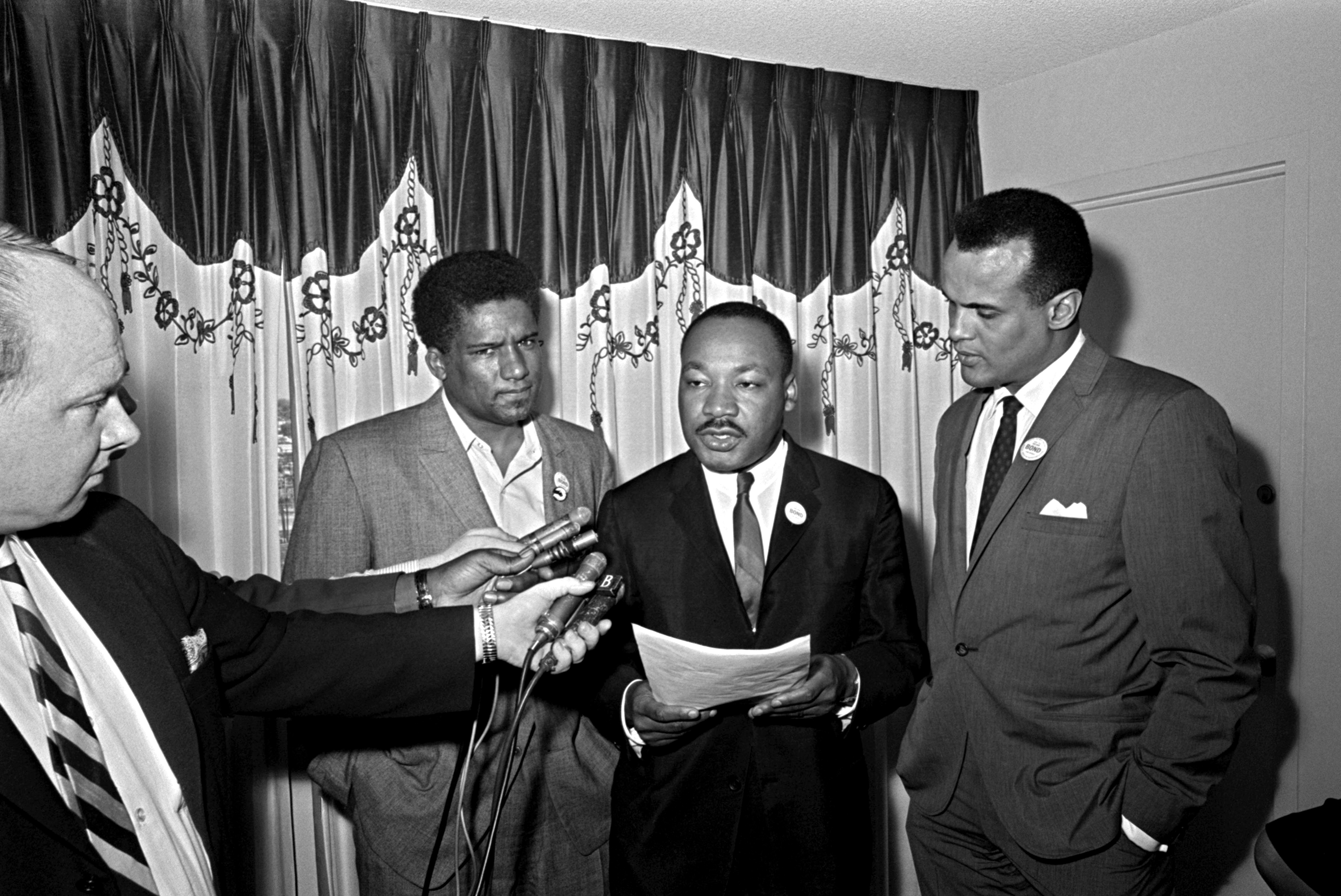 Martin Luther King, flanked by James Foreman, executive secretary of the Student Non-violent Coordinating Committee (left) and singer Harry Belafonte. Photo / Horace Cort