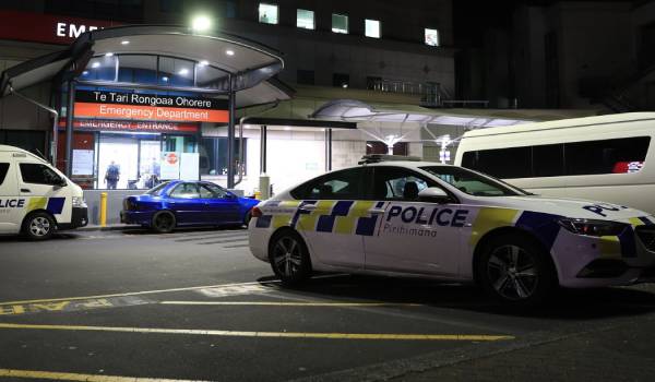 Police guarding Auckland's Middlemore Hospital after a man presented with a gunshot wound. Photo / Hayden Woodward