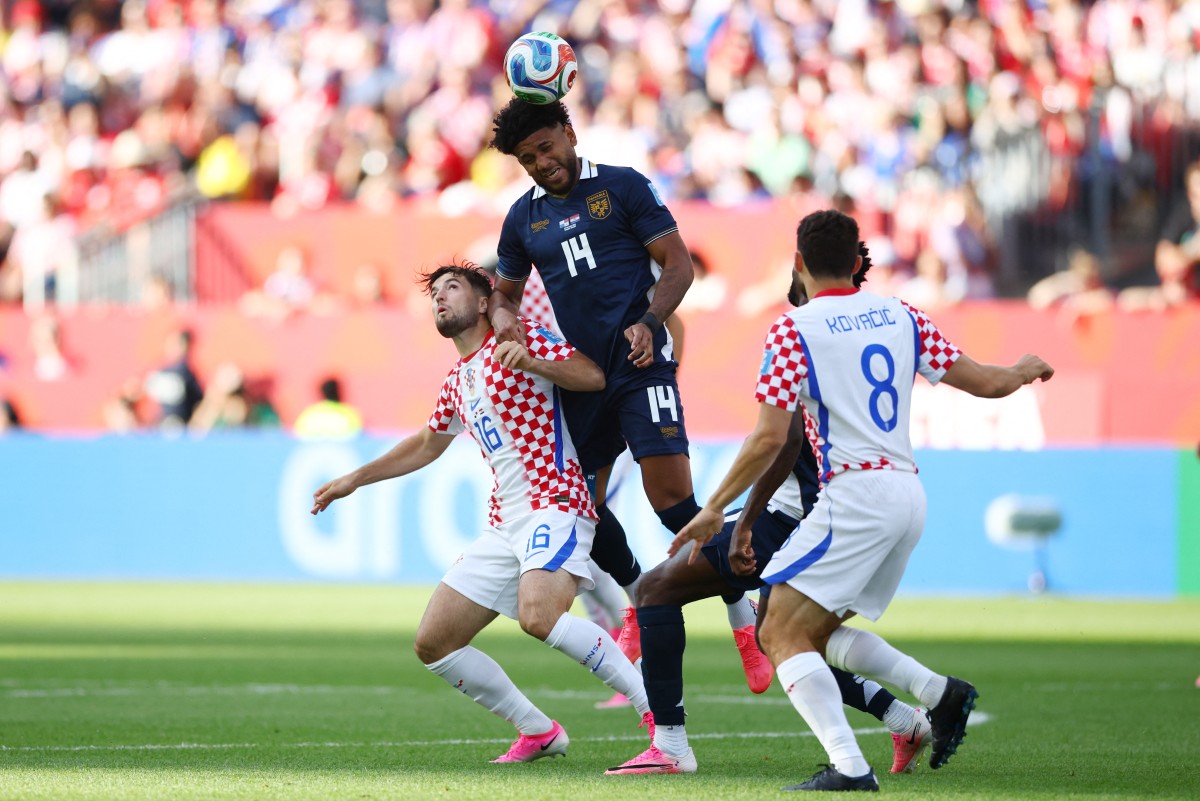 Croatia's midfielder Martin Baturina and Panama's midfielder Carlos Harvey fight for the ball. Photo / AFP