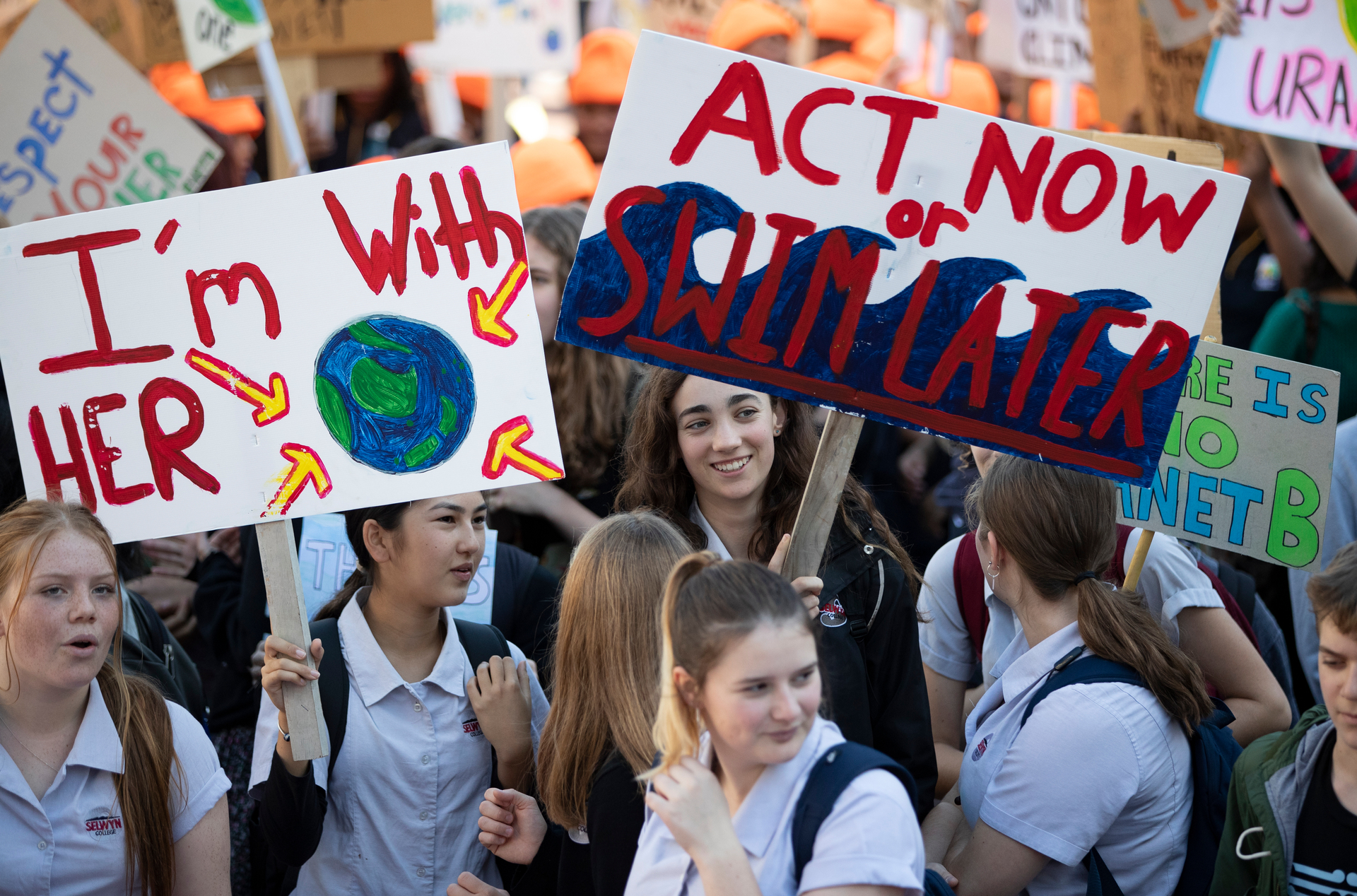 Students on Queen St in Auckland's CBD during a march calling for  climate change action. Photo / Peter Meecham 

