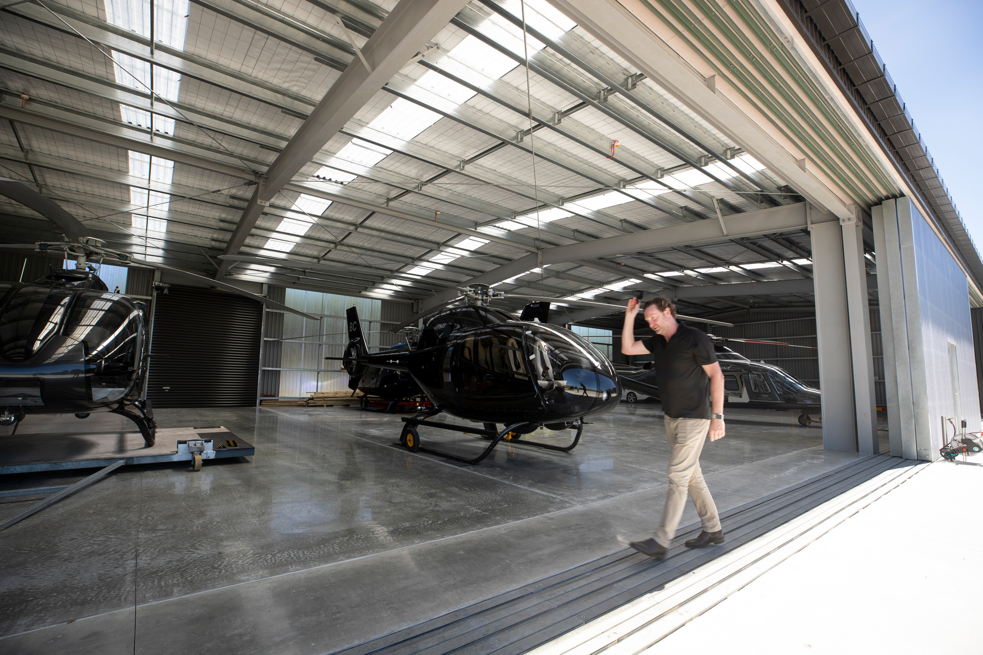 John Ambler at the hangar at Heletranz in Albany. Photo / Dean Purcell