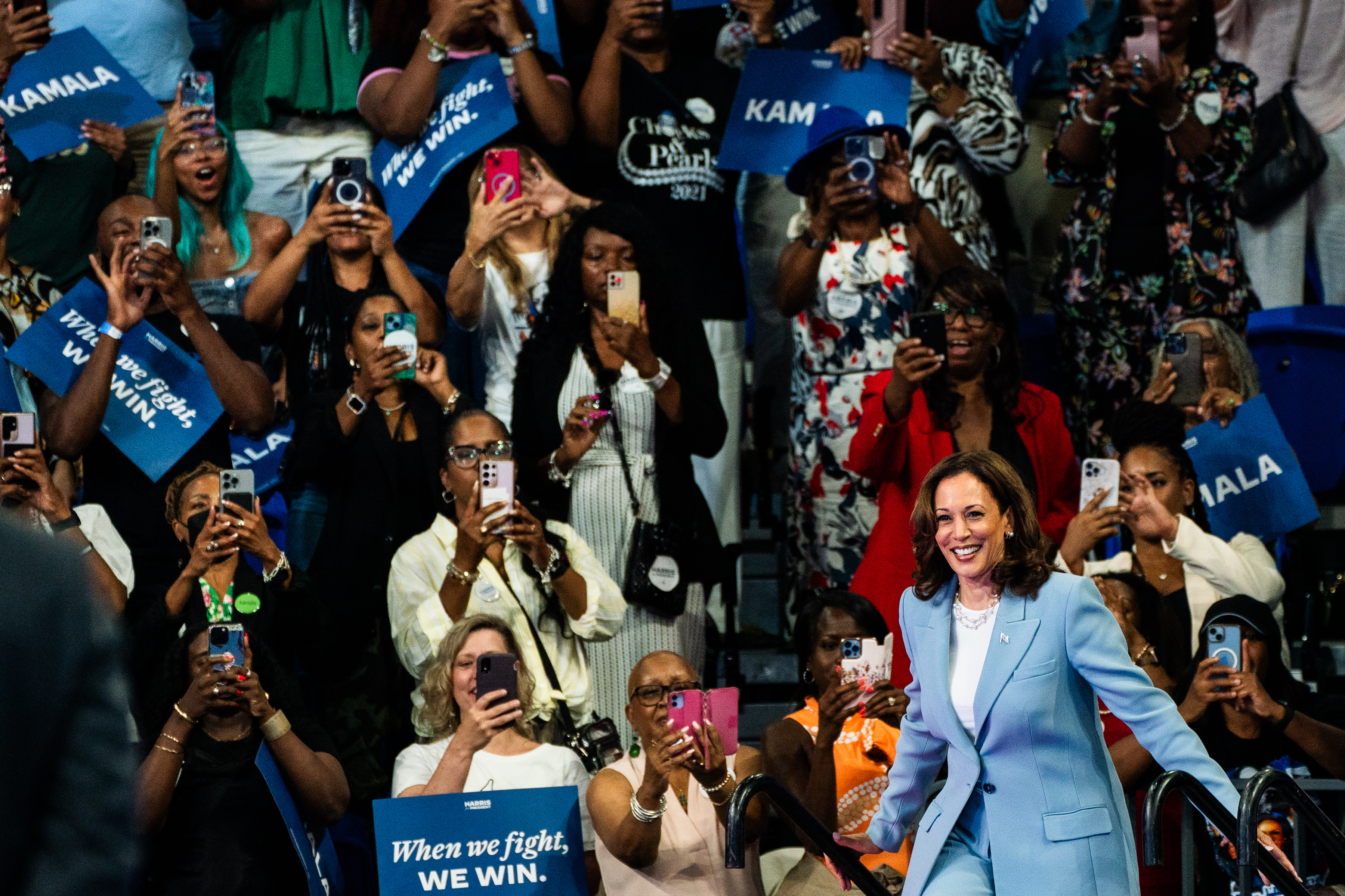 Vice President Kamala Harris takes the stage for a campaign event at the Georgia State Convocation Center in Atlanta on Tuesday. MUST CREDIT: Demetrius Freeman/The Washington Post