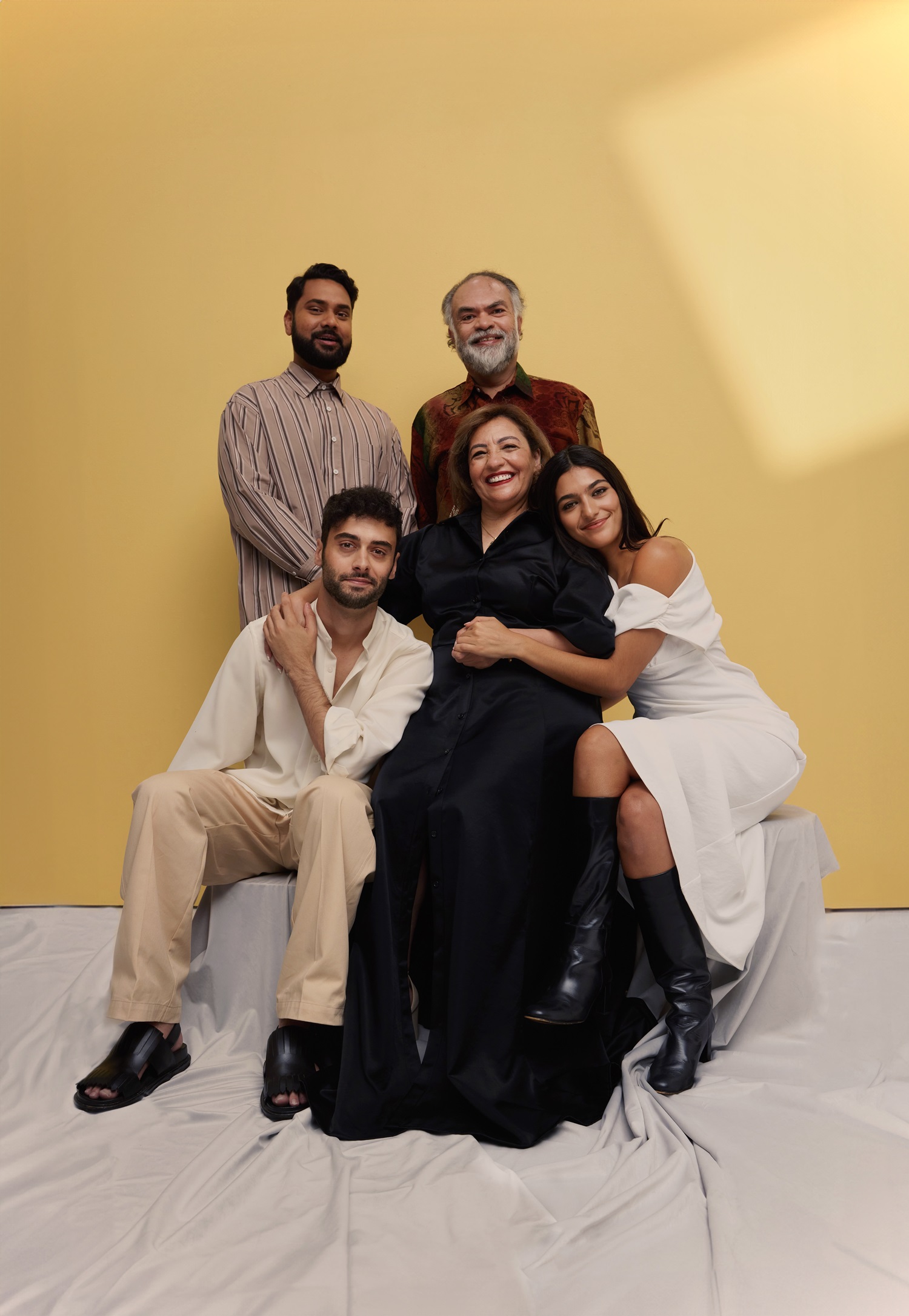 “The word minority is so crazy because it’s a global majority,” says Arlo Green. Clockwise from back left: Bala wears a Thom Morison shirt; Mustaq wears his own shirt; Roxie wears a Paris Georgia dress from Simon James and Gucci boots; Sherin wears a Juliette Hogan dress; Arlo wears own shirt, Thom Morison trousers and Marni sandals. Photo / Matt Hurley