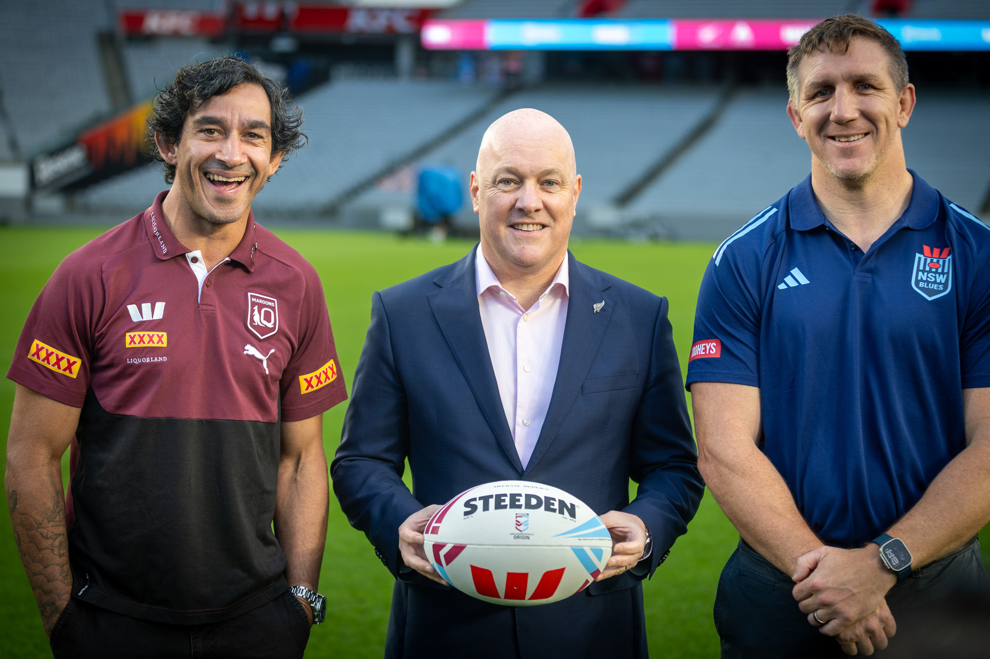 Former Queensland representative Johnathan Thurston (left) with Prime Minister Christopher Luxon and ex-NSW player Ryan Hoffman for the announcement of a State of Origin match at Eden Park. Photo / Michael Craig